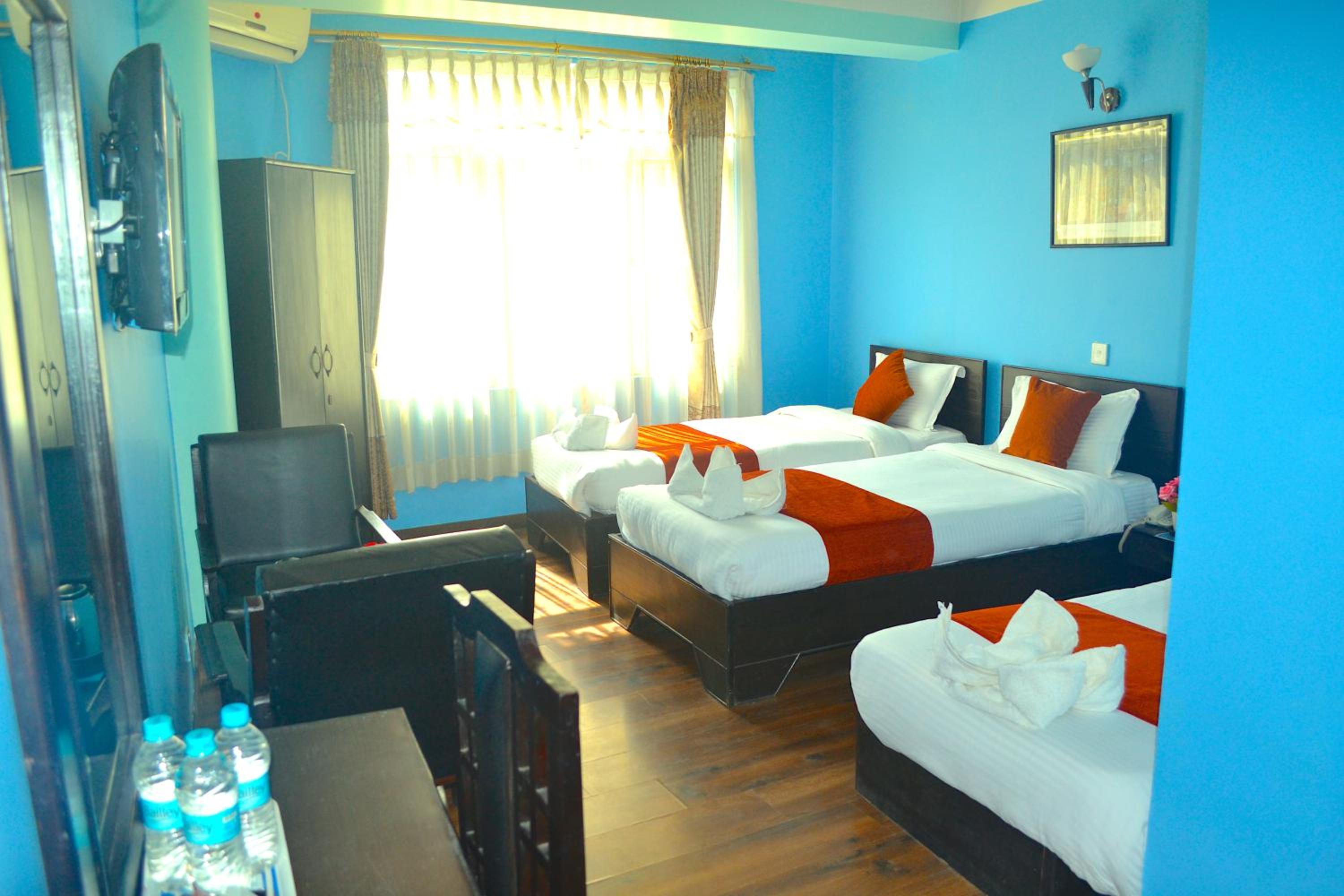 Deluxe Triple Room