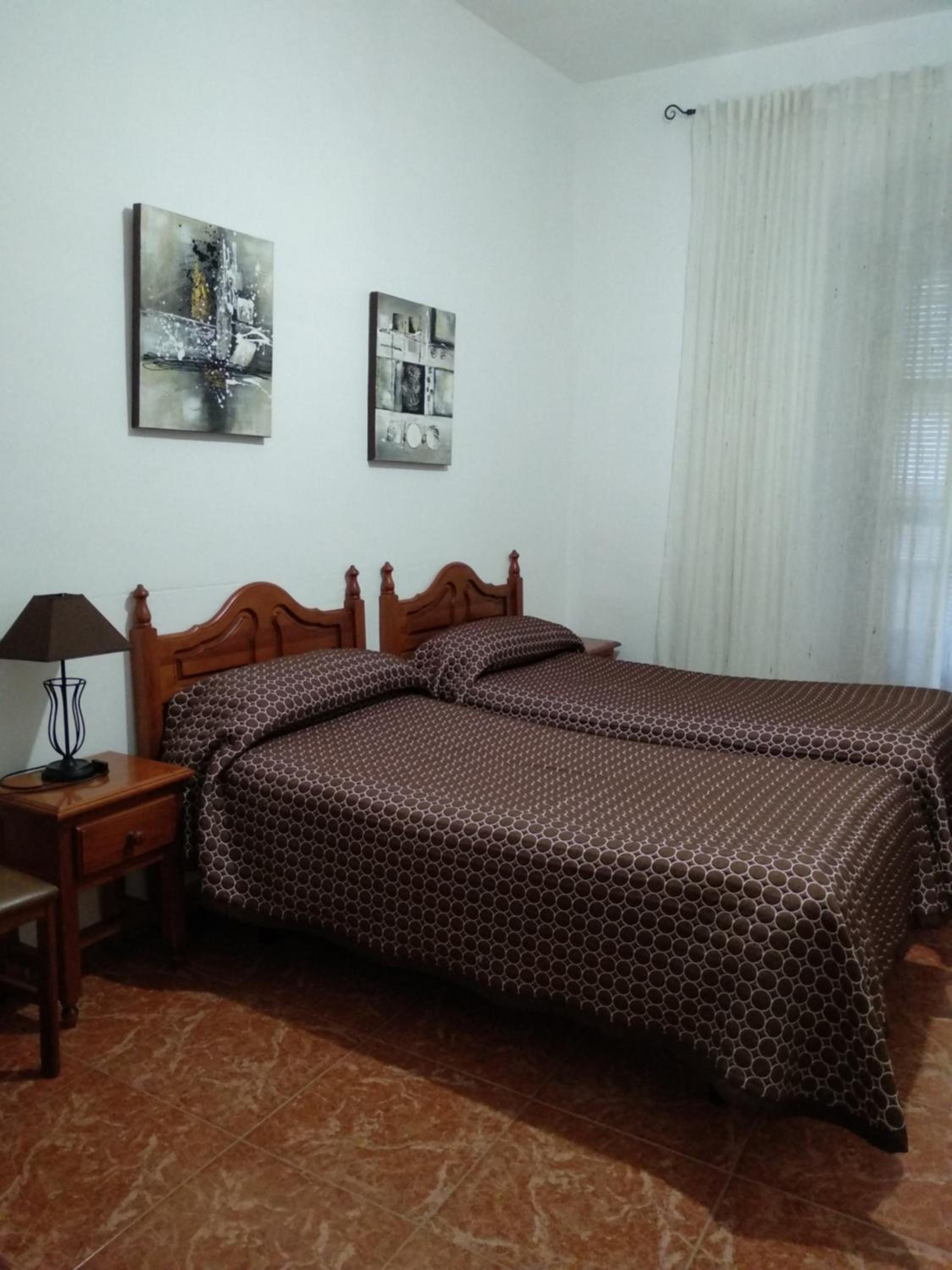 Habitación Doble con cama extra y baño privado