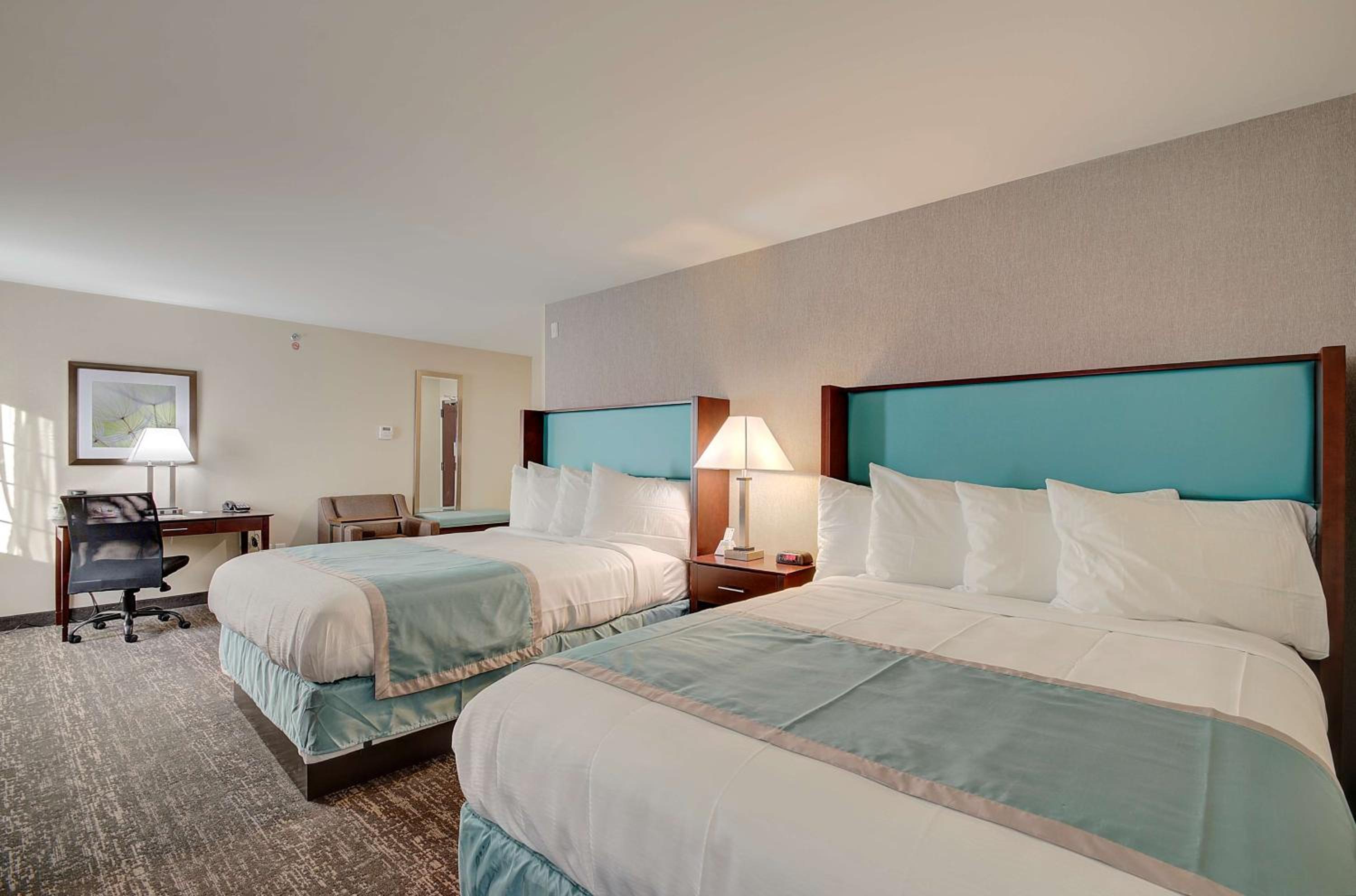Queen Suite with Two Queen Beds and Sofa Bed photo 1