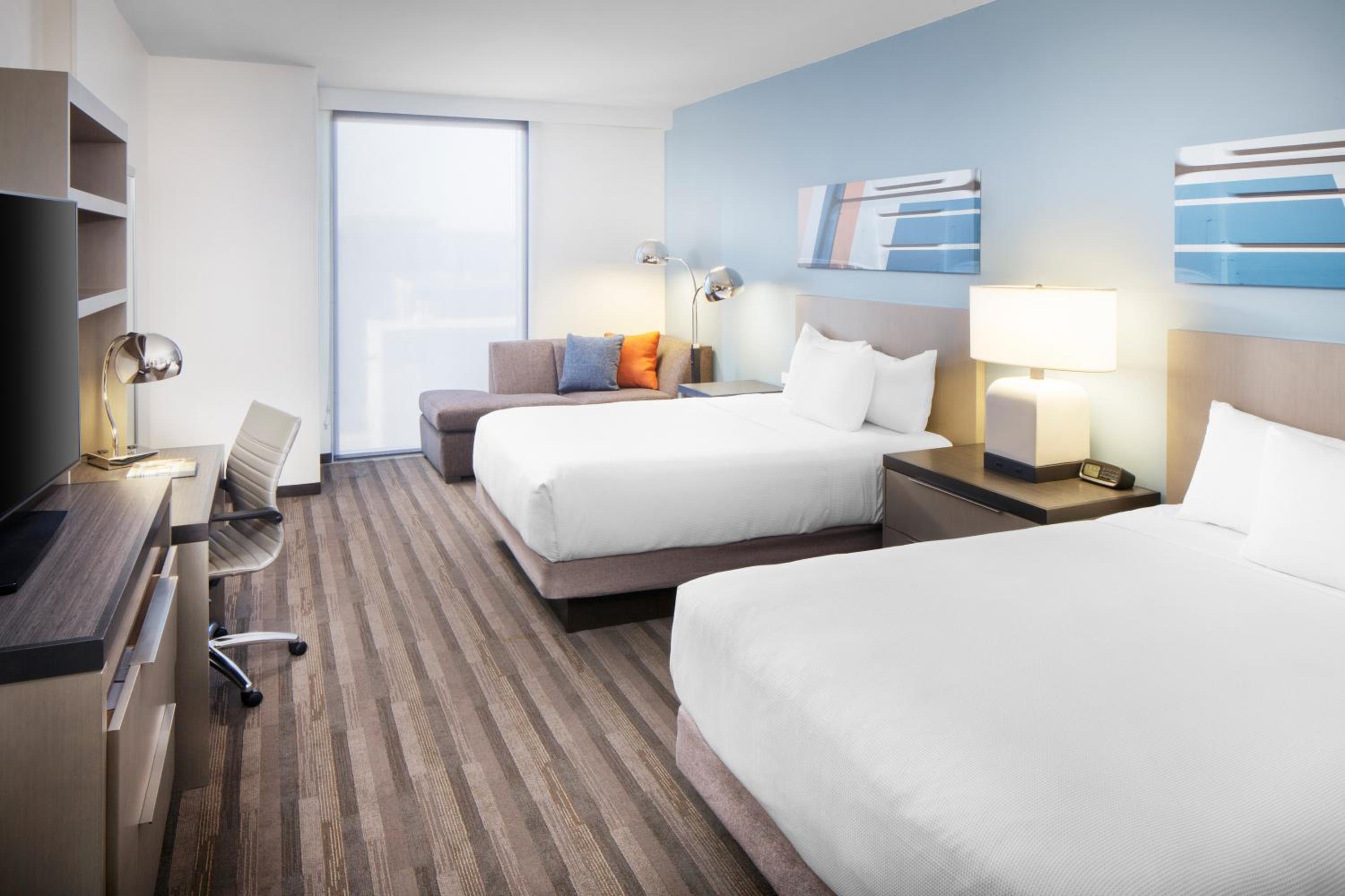 Den Guestroom with Two Queen Beds at Hyatt House Nashville at Vanderbilt in Nashville