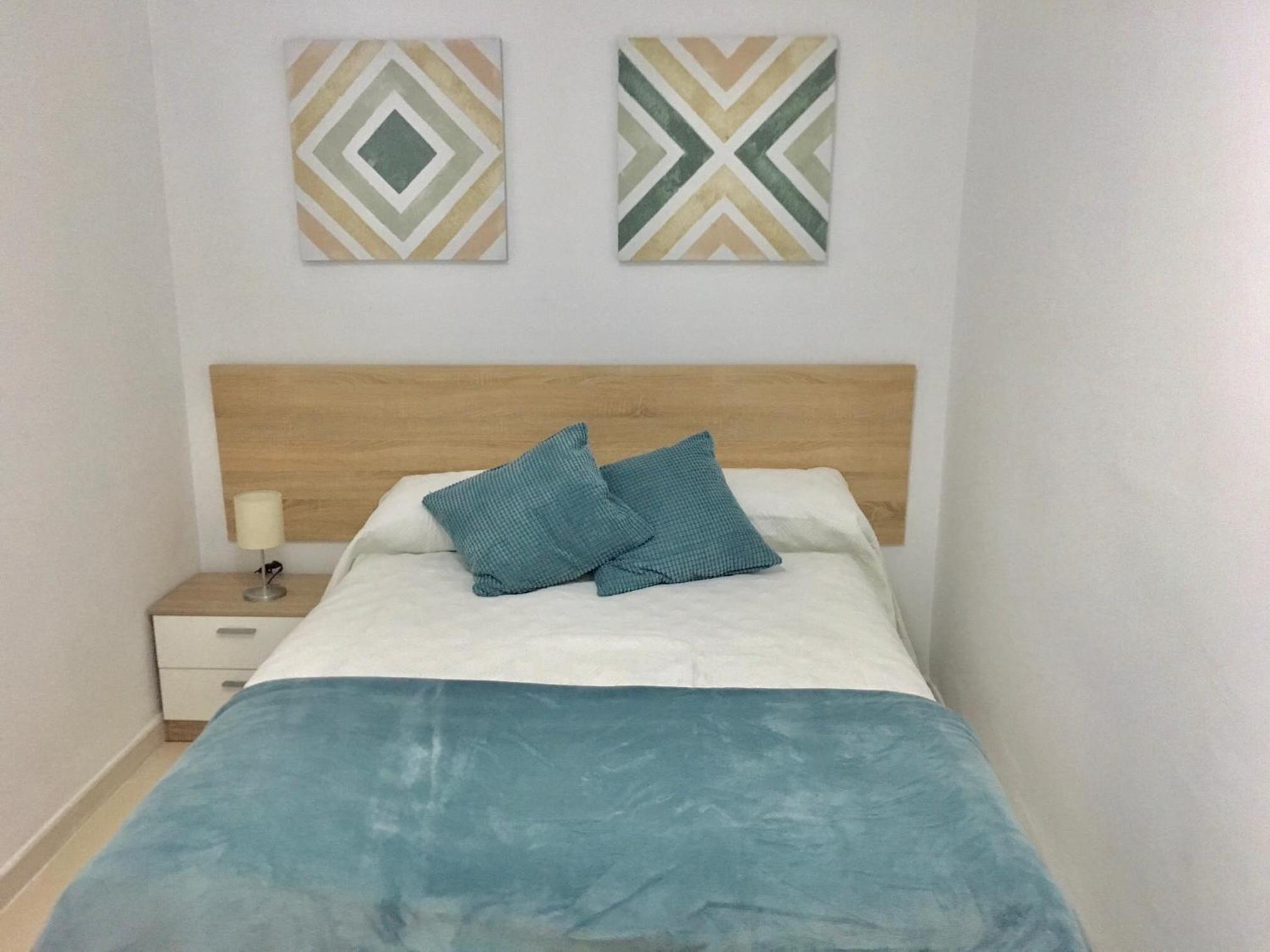 Three-Bedroom Apartment - Photo 2
