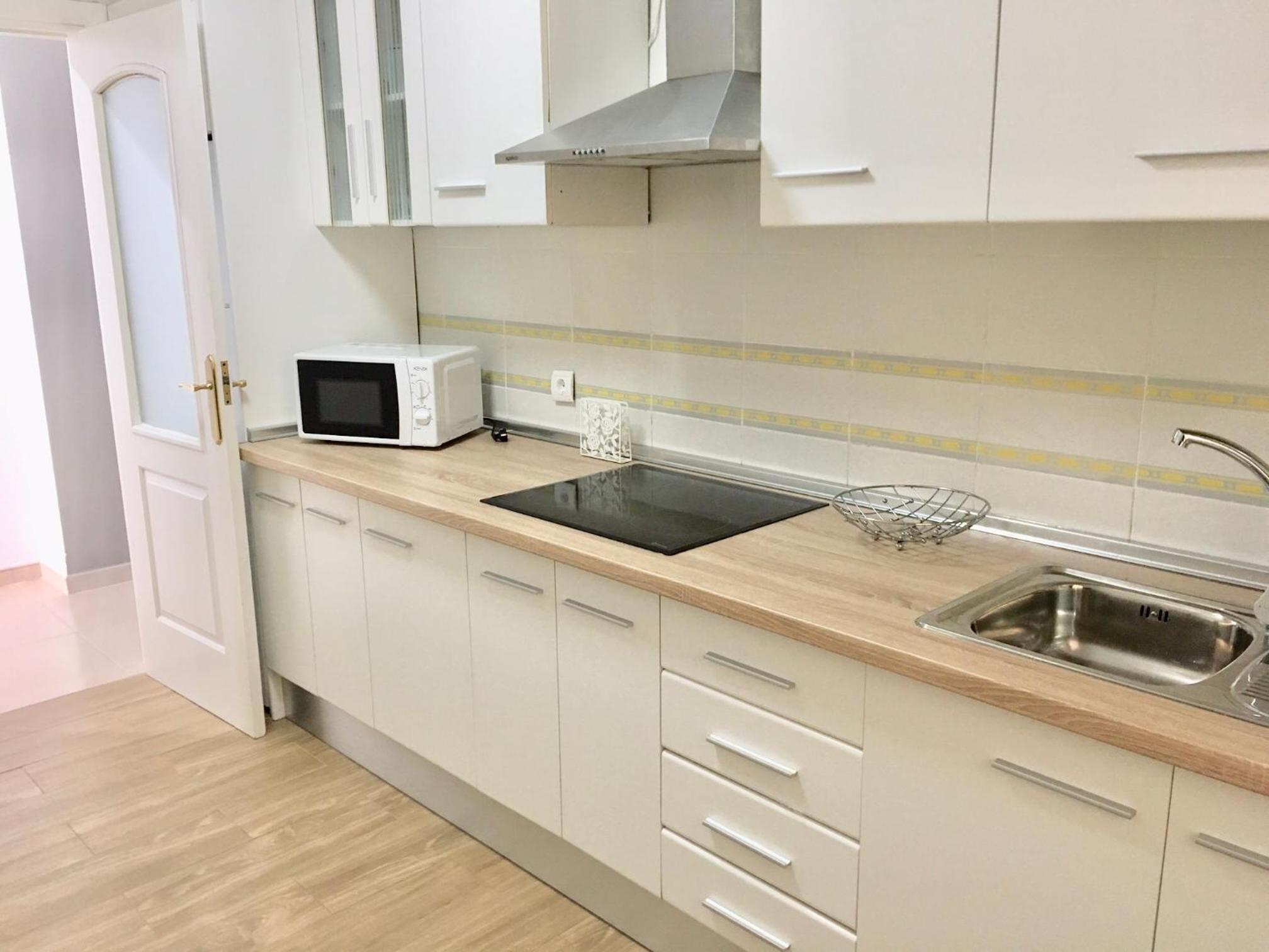 Three-Bedroom Apartment - Photo 13