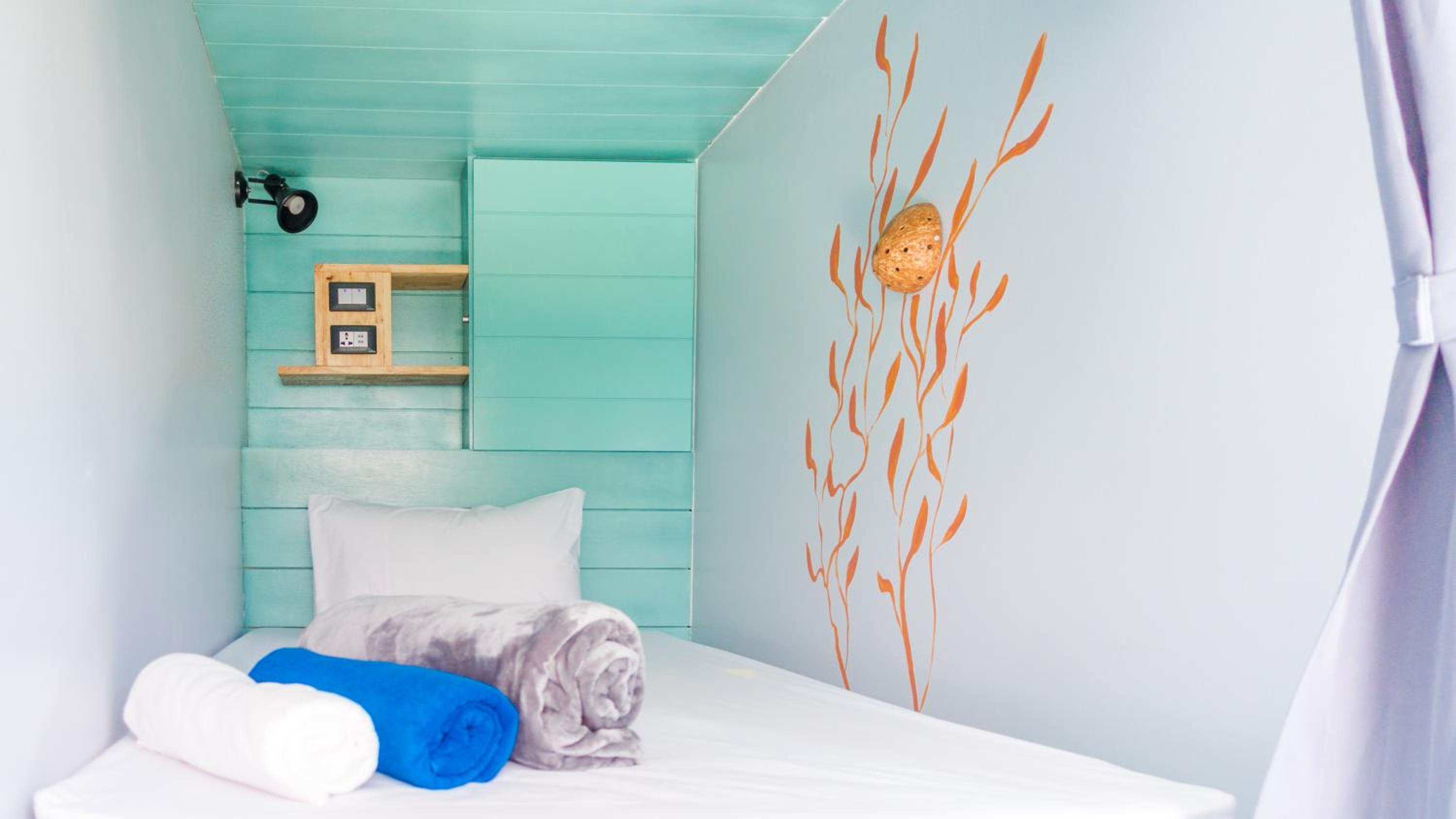 Single Bed in Dormitory Room