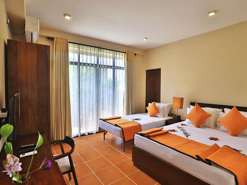 Deluxe Triple Room photo 3