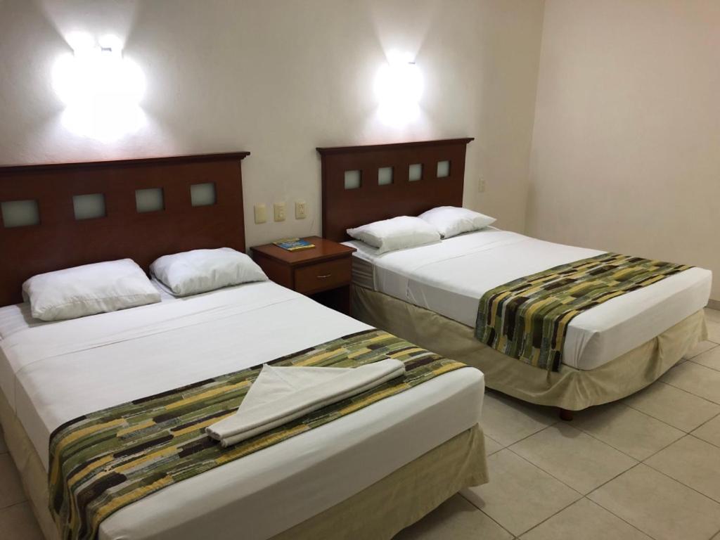Queen Room With Two Queen Beds photo 1
