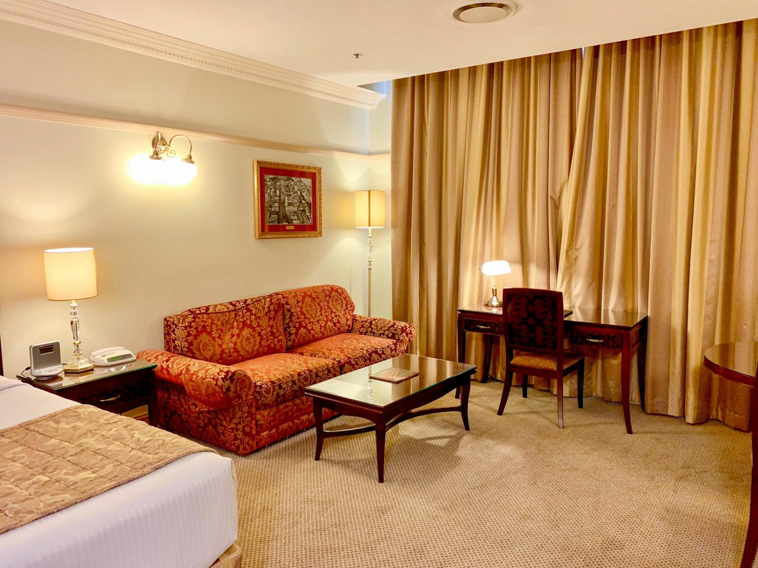 Deluxe Hotel Room - Photo 8