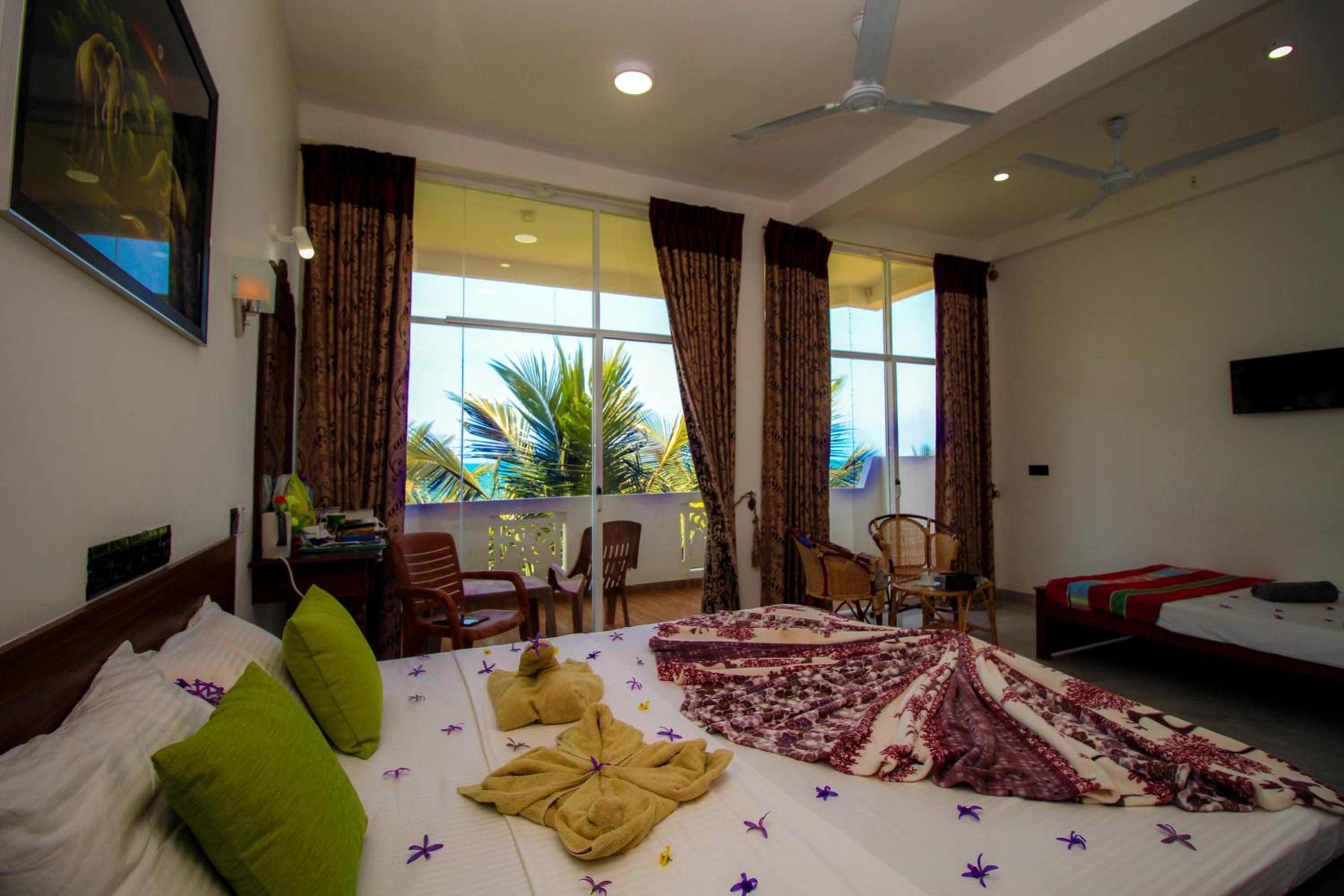 Deluxe Triple Room with Sea View