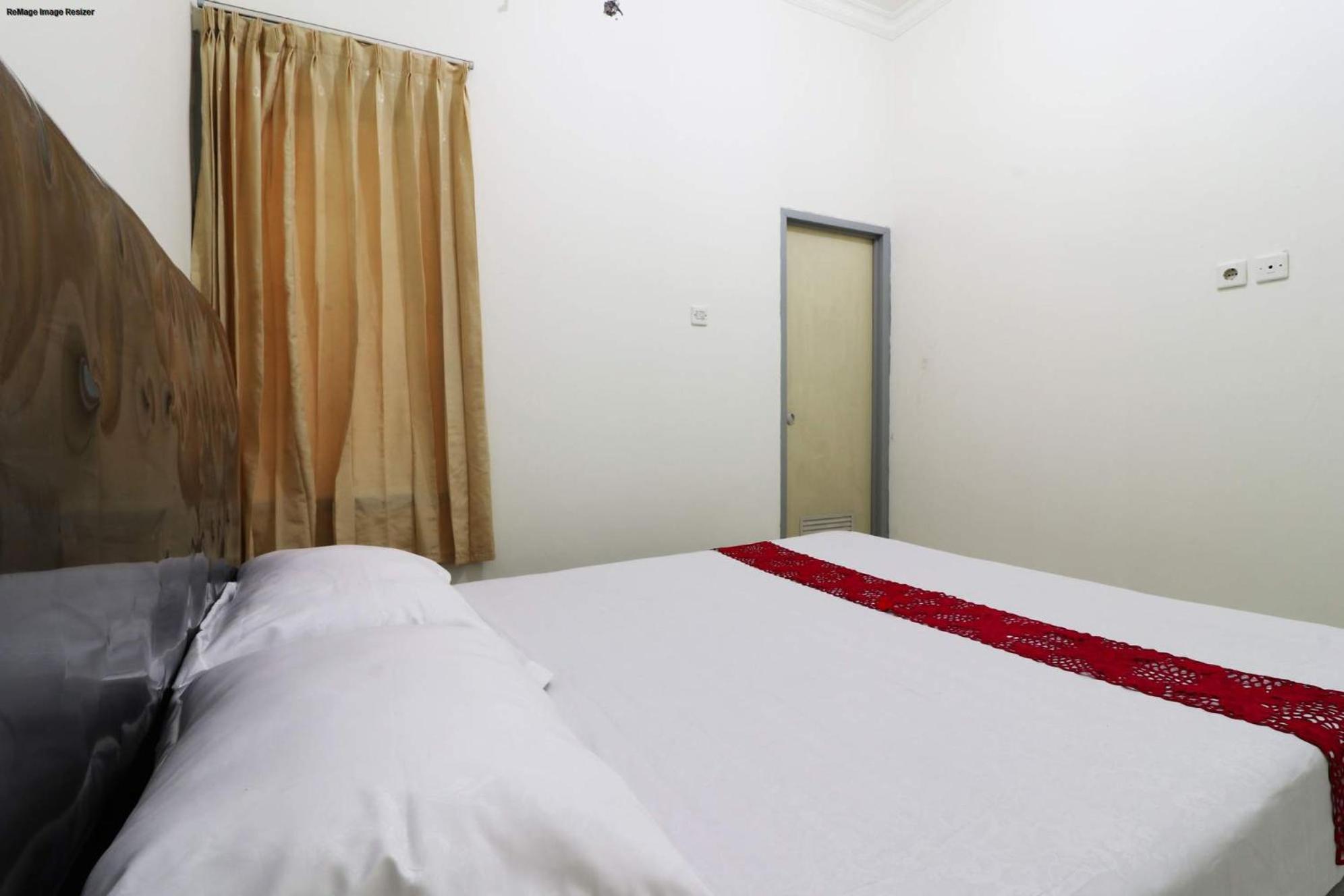 Deluxe Double Room - Photo 9