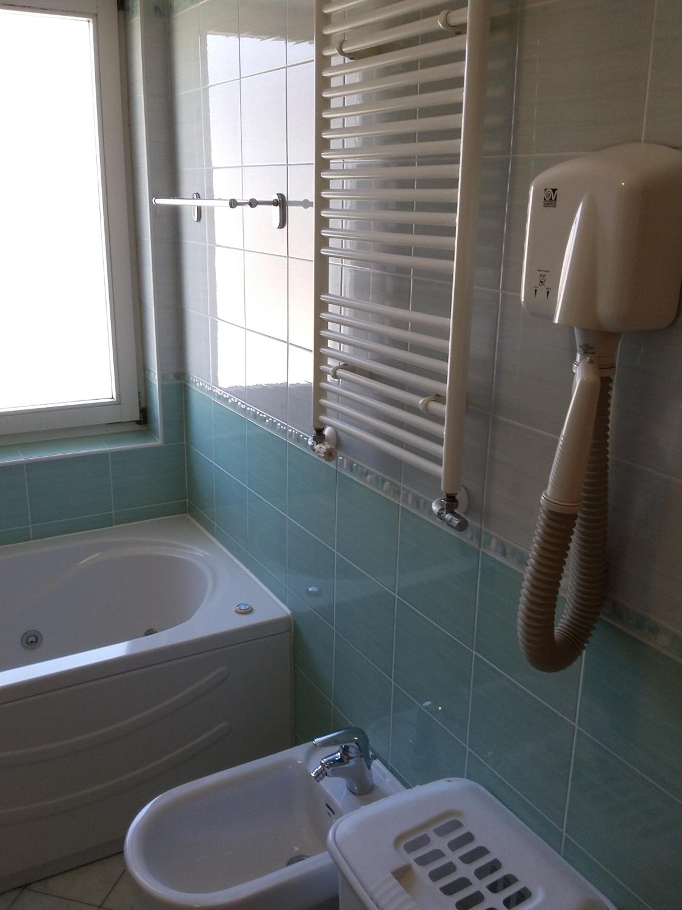 Apartment with Balcony - Photo 14