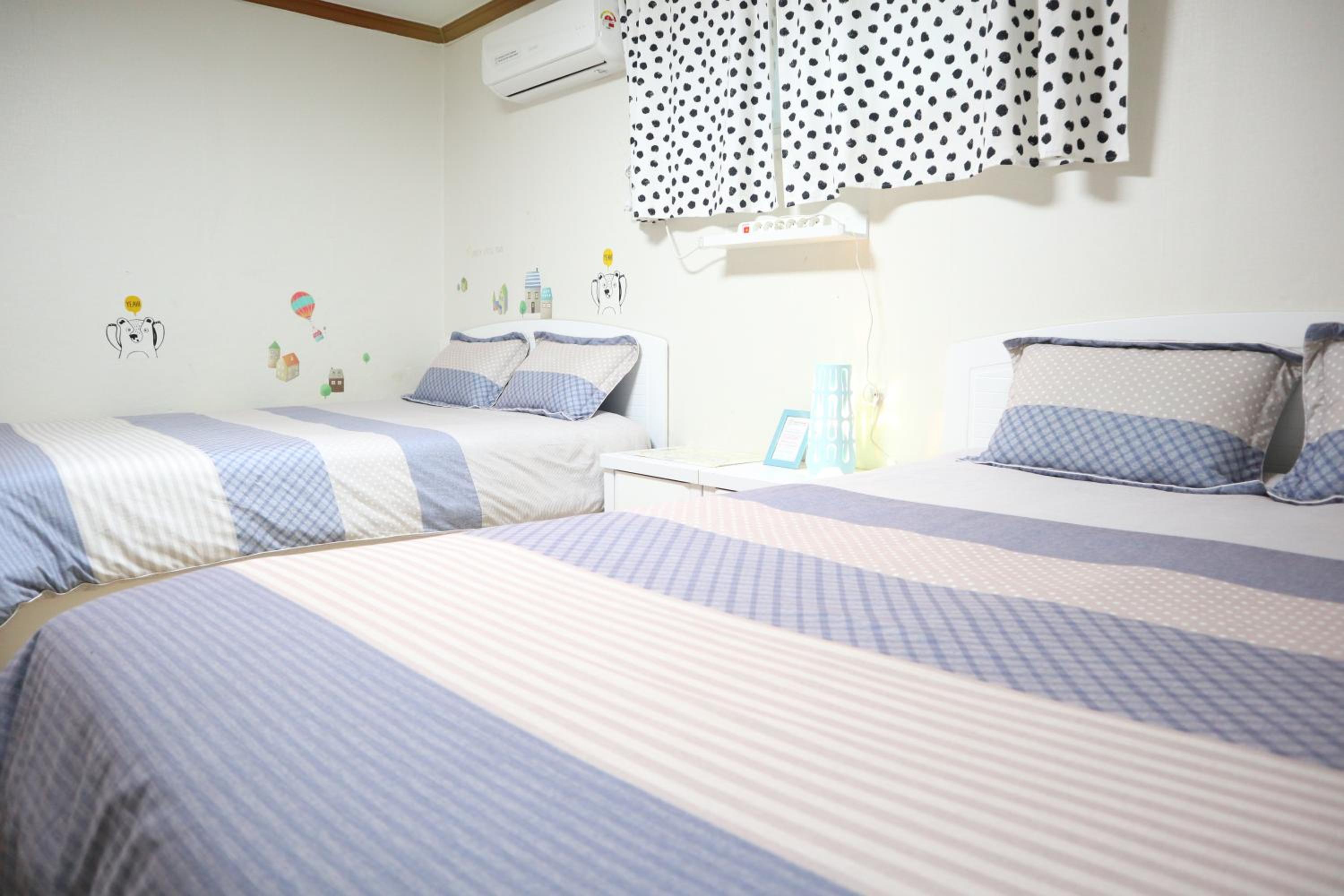 Economy Quadruple Room with Shared Bathroom
