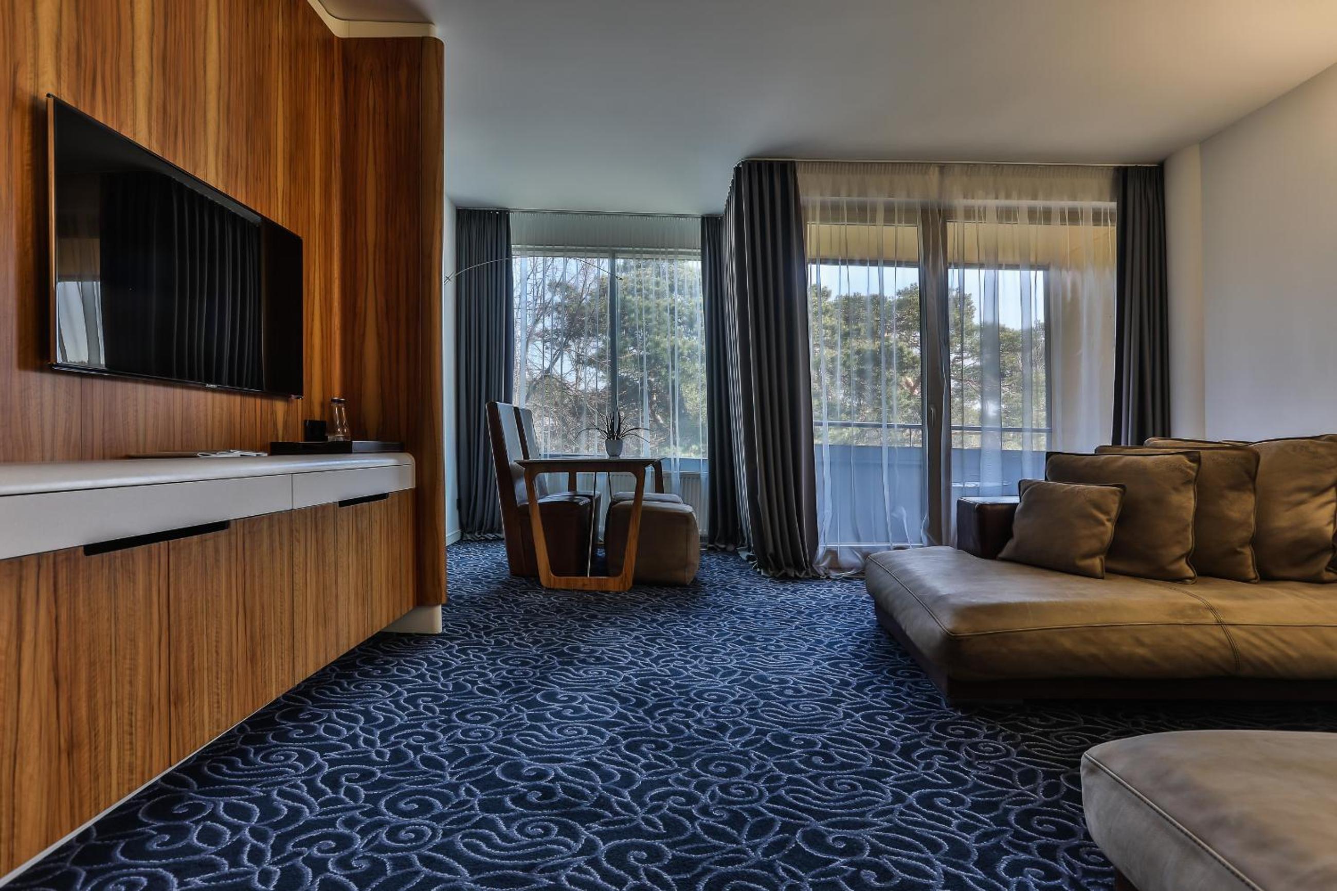 Deluxe Suite with Spa Access - Building Design - Photo 1
