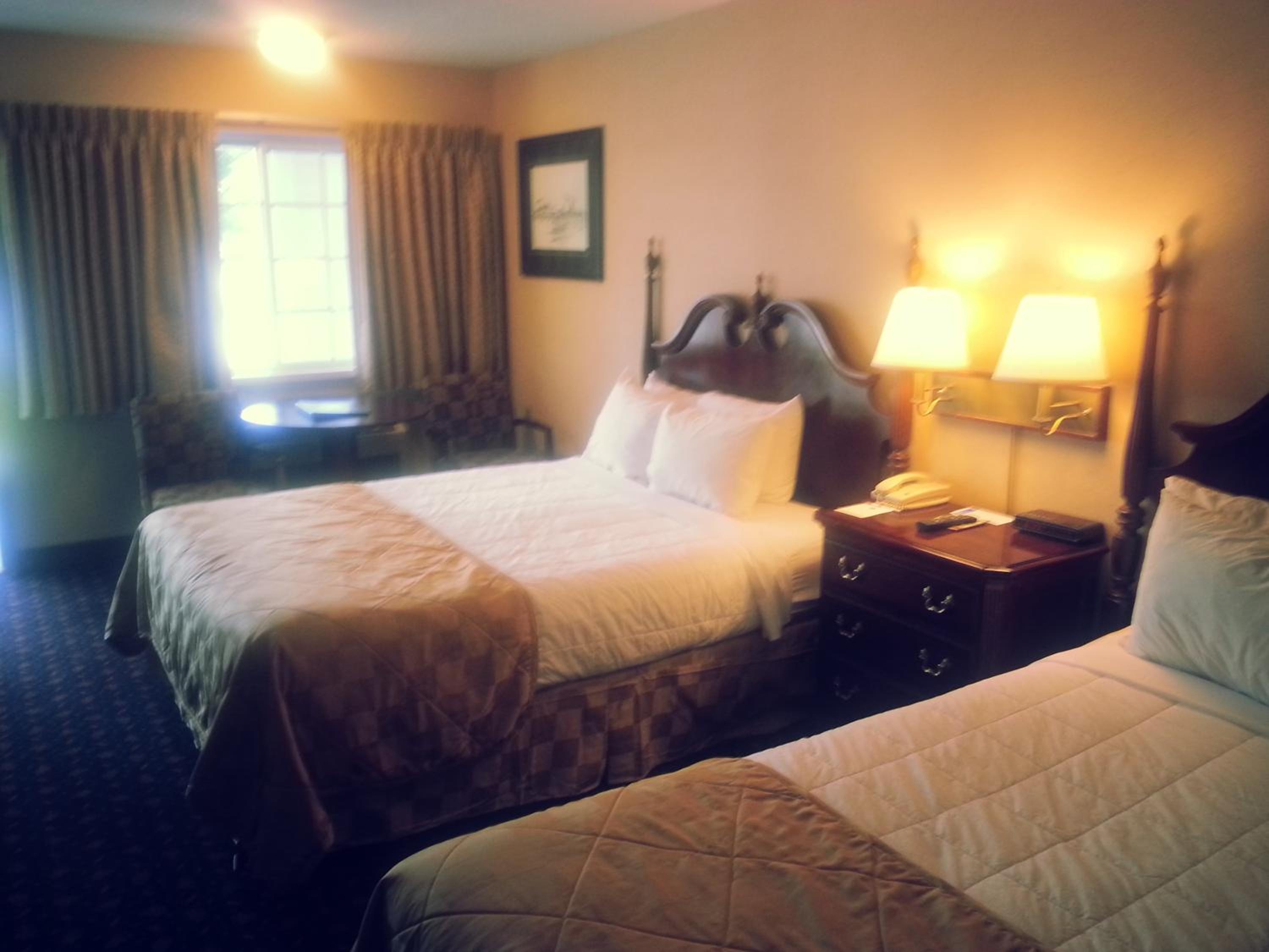 Queen Room with Two Queen Beds - Courtyard View - Photo 1