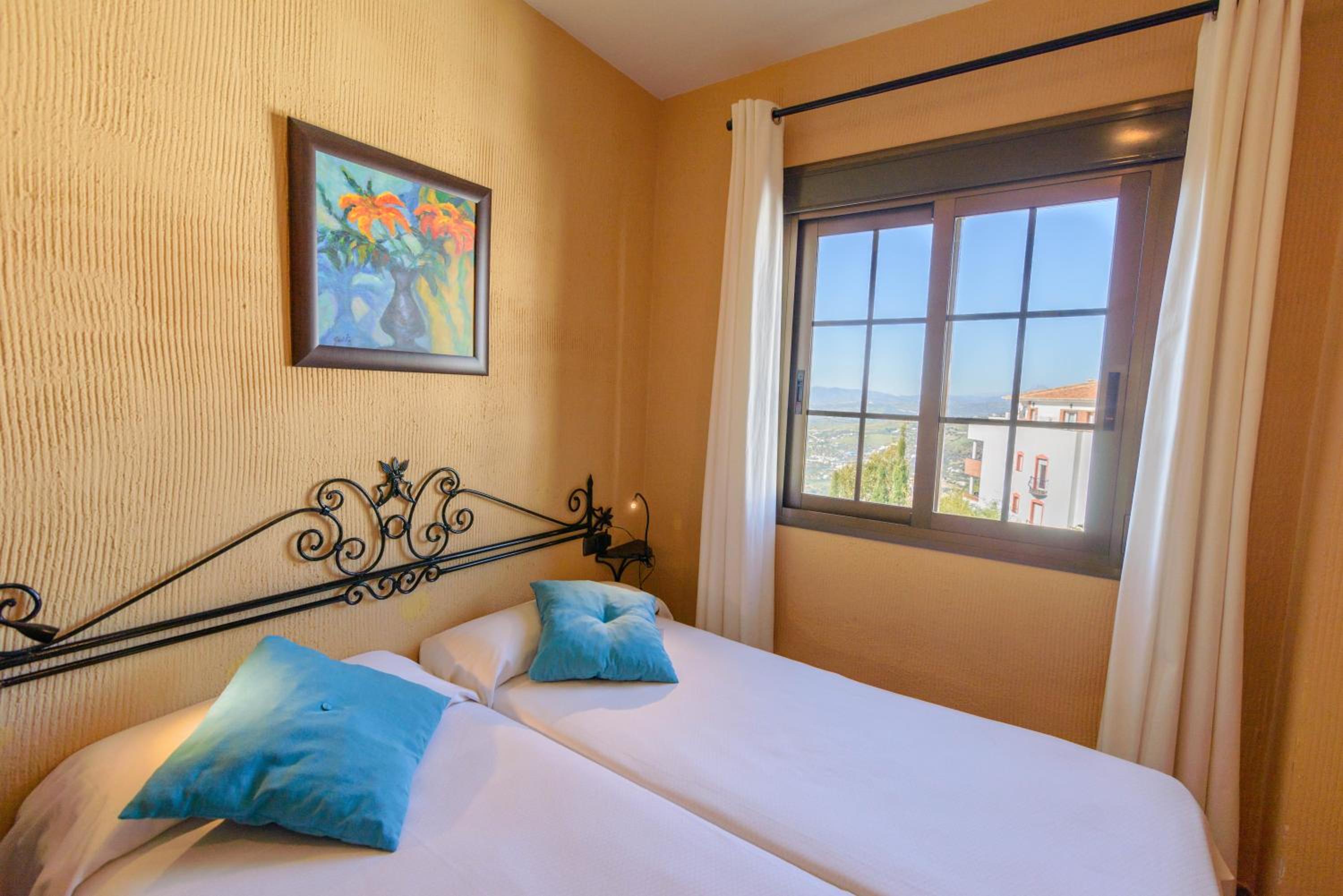 Habitación Cuádruple con Vista al Jardín