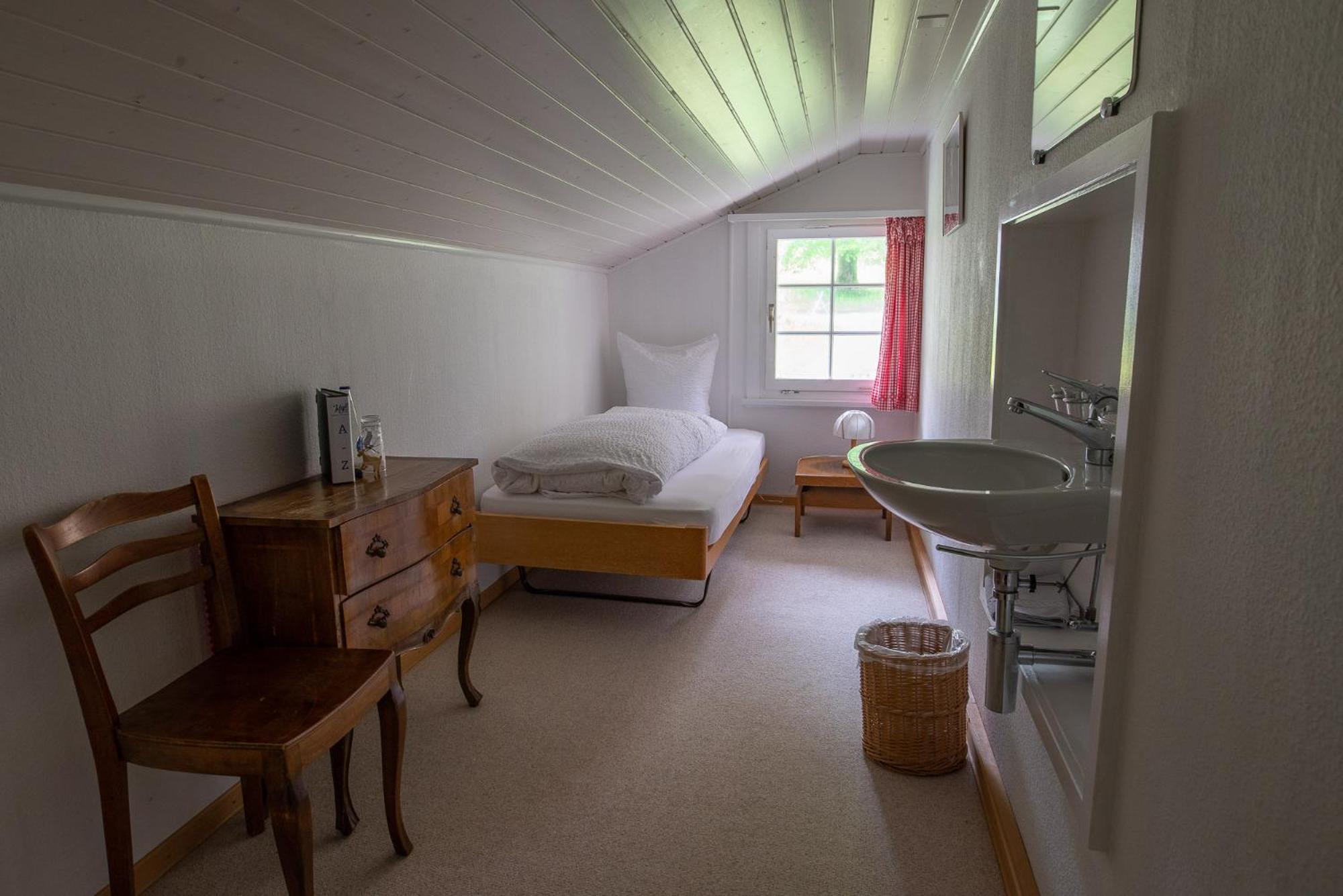 Single Room with Shared Shower and Toilet