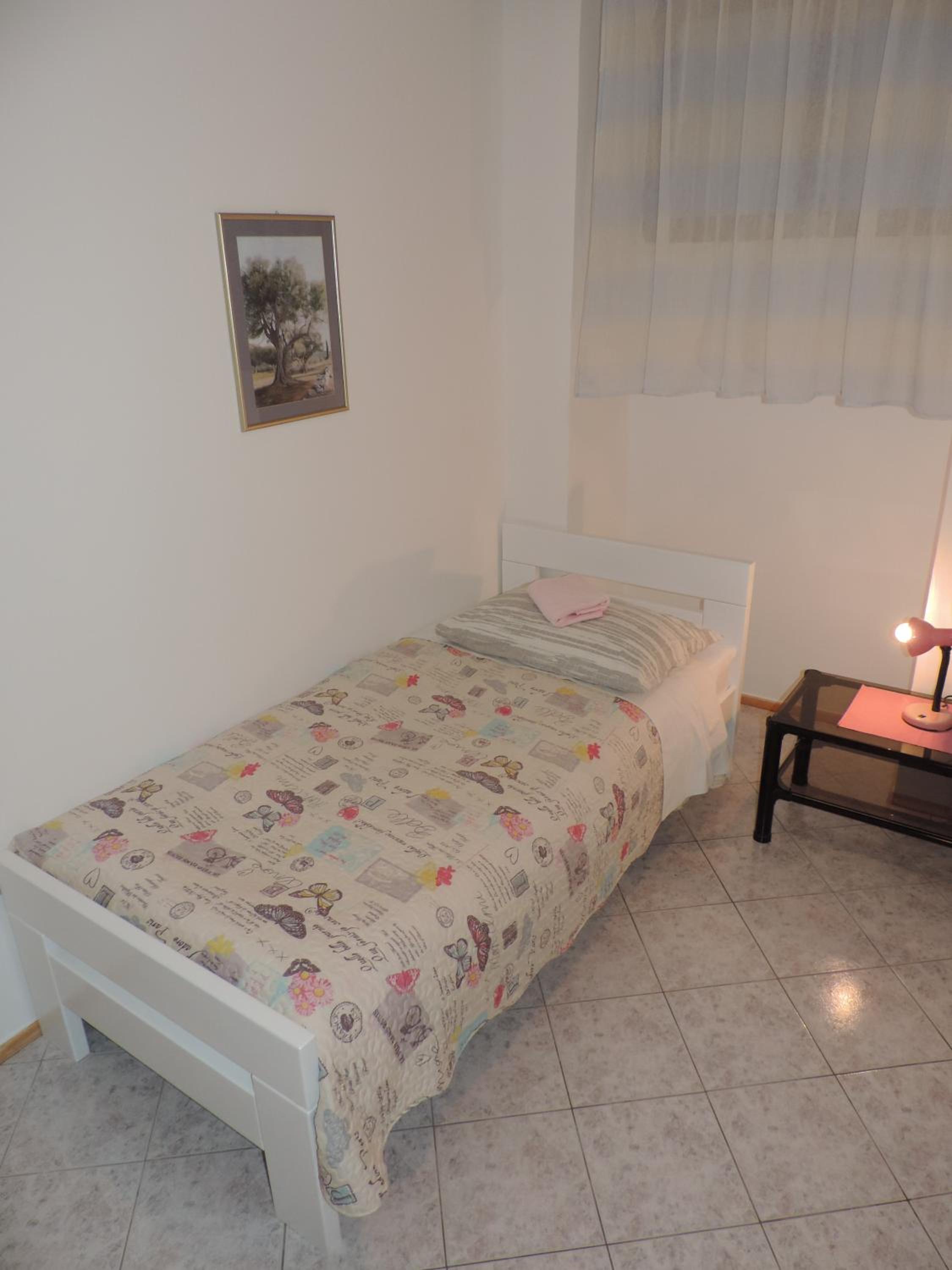 One-Bedroom Apartment with Patio - Photo 11