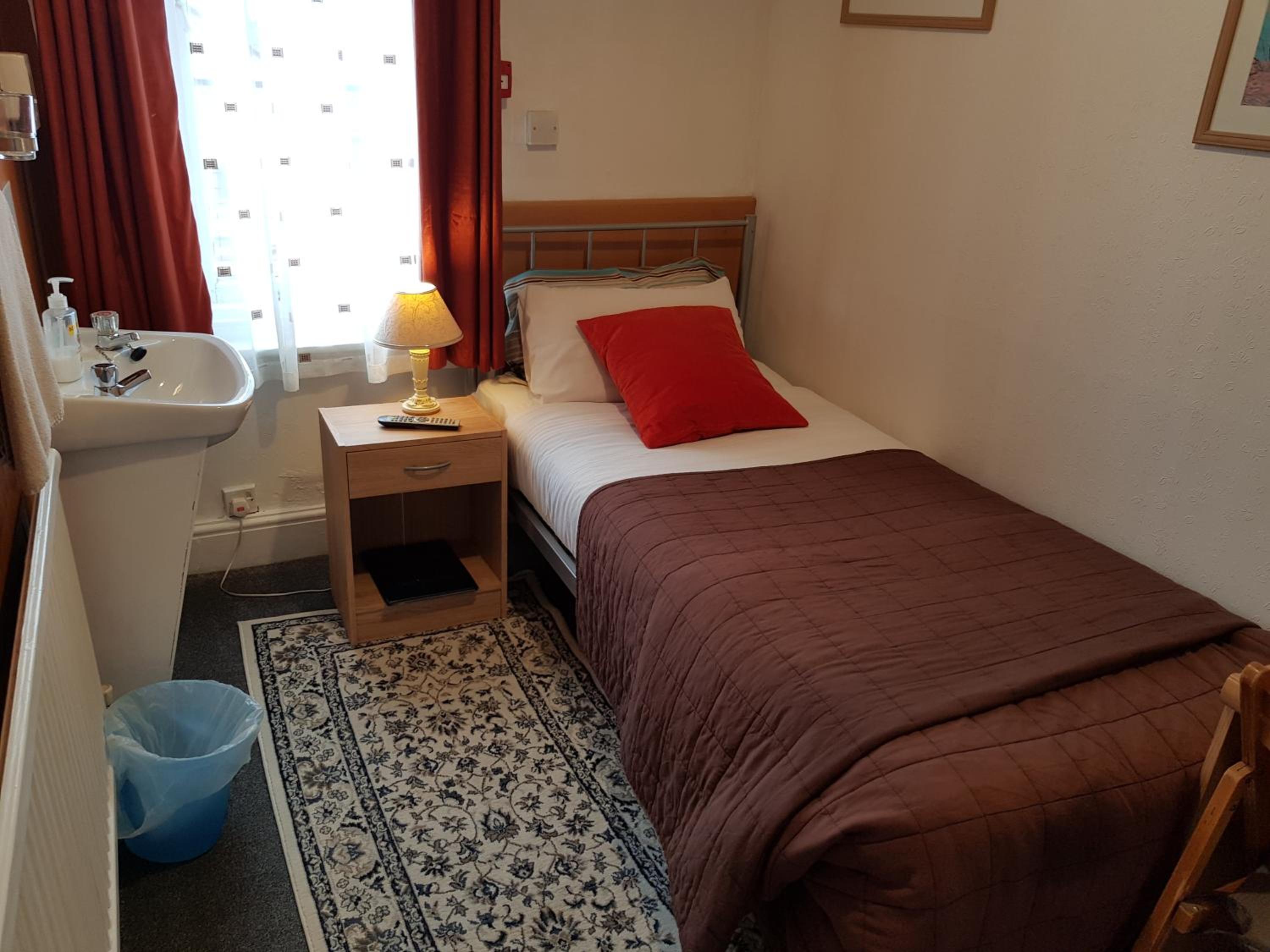 Single Room with Shared Shower and Toilet