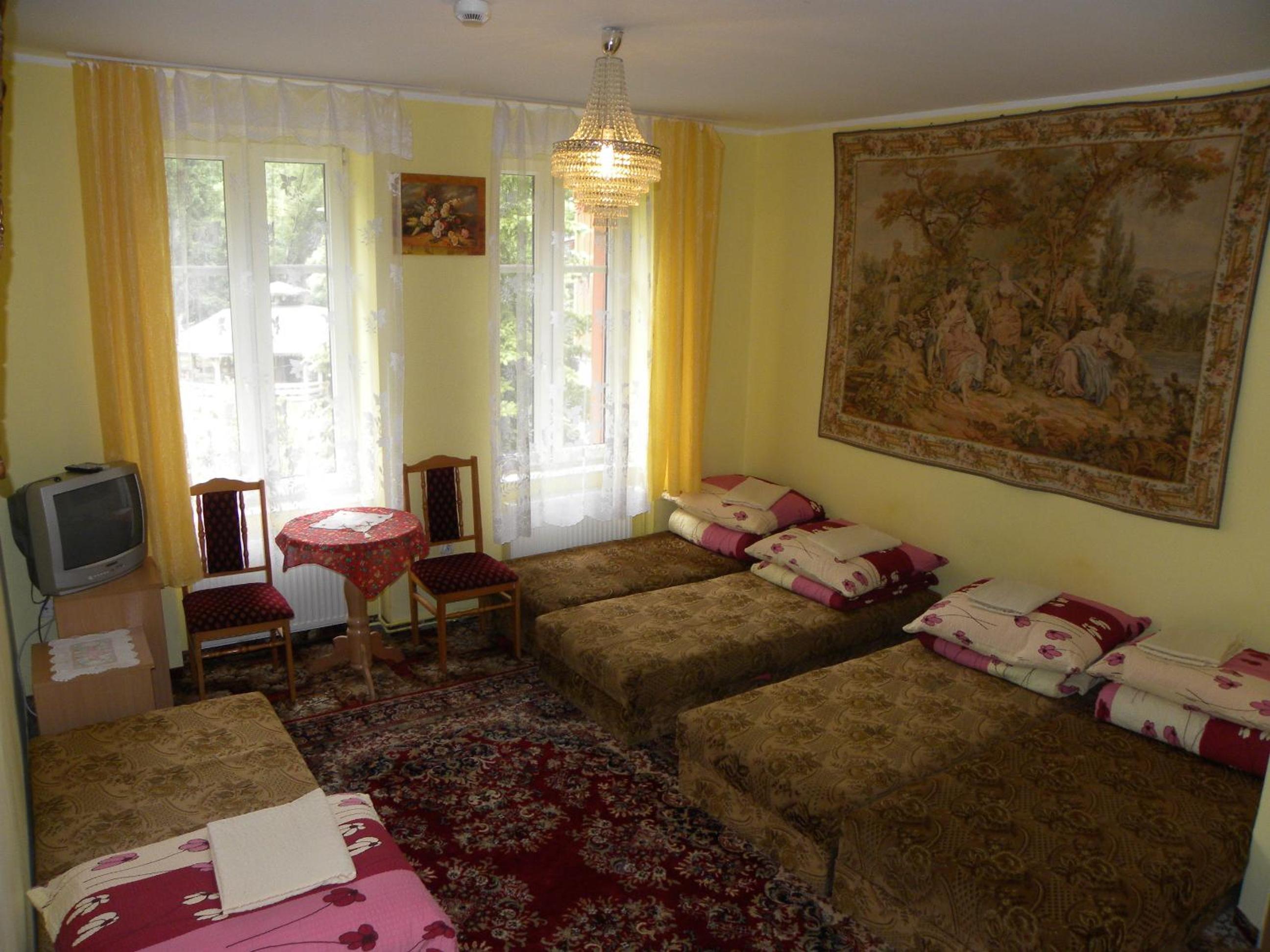 Quadruple Room (2 Adults + 2 Children) photo 1