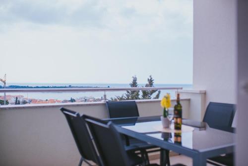 Three-Bedroom Apartment with Terrace and Sea View