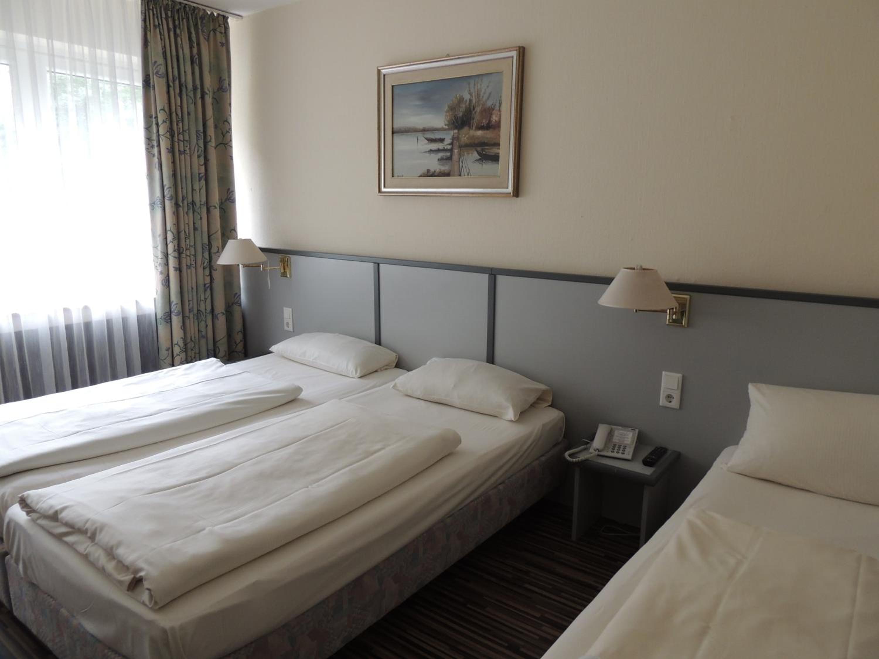 Triple Room - Photo 1