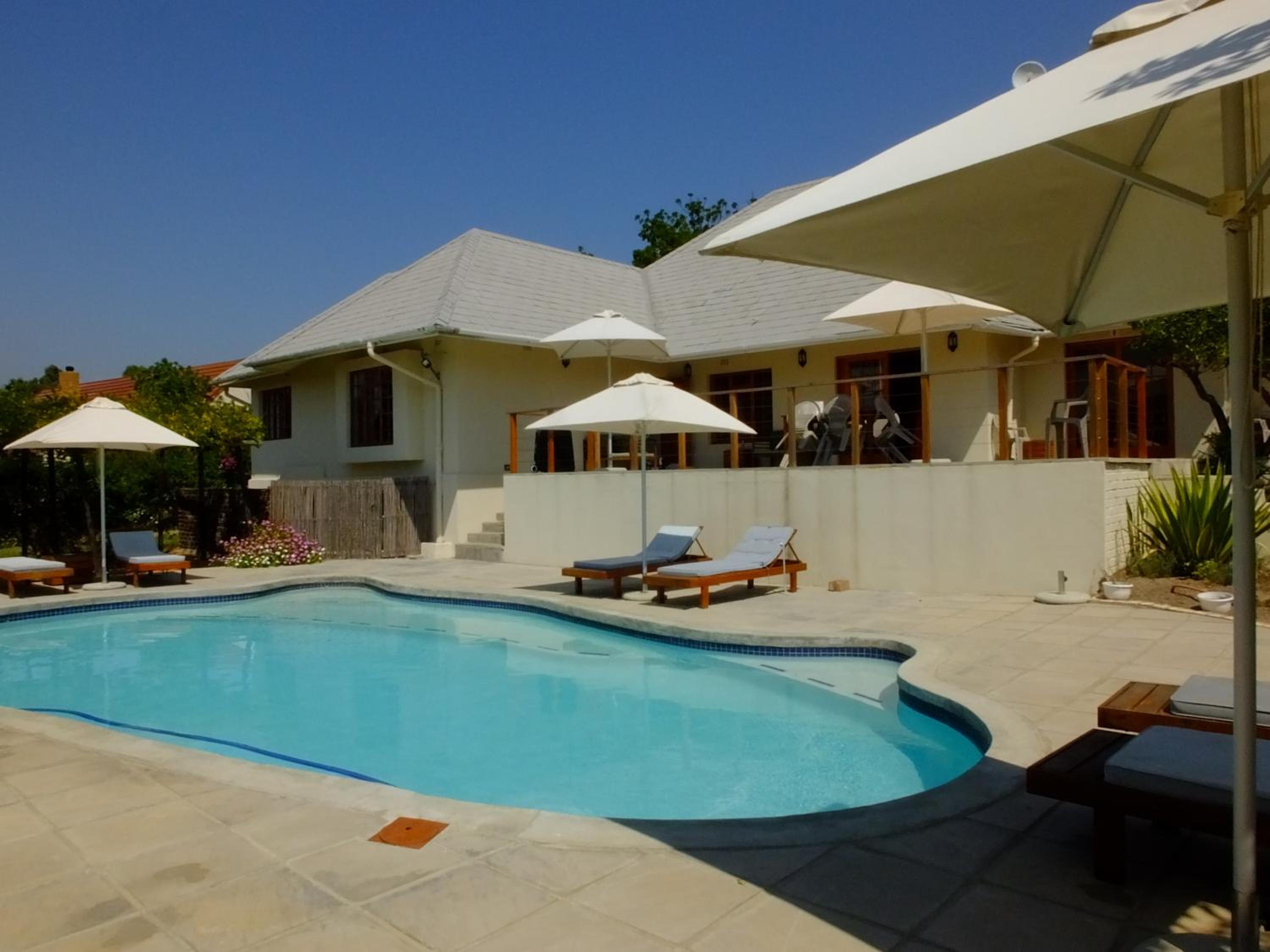 Three-Bedroom House - Photo 25