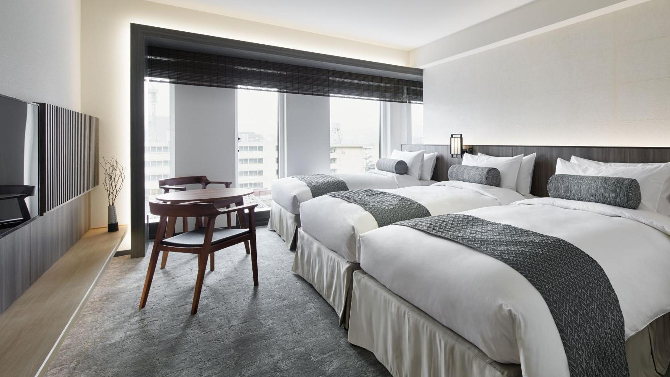 Twin Room with Extra Bed - Photo 1