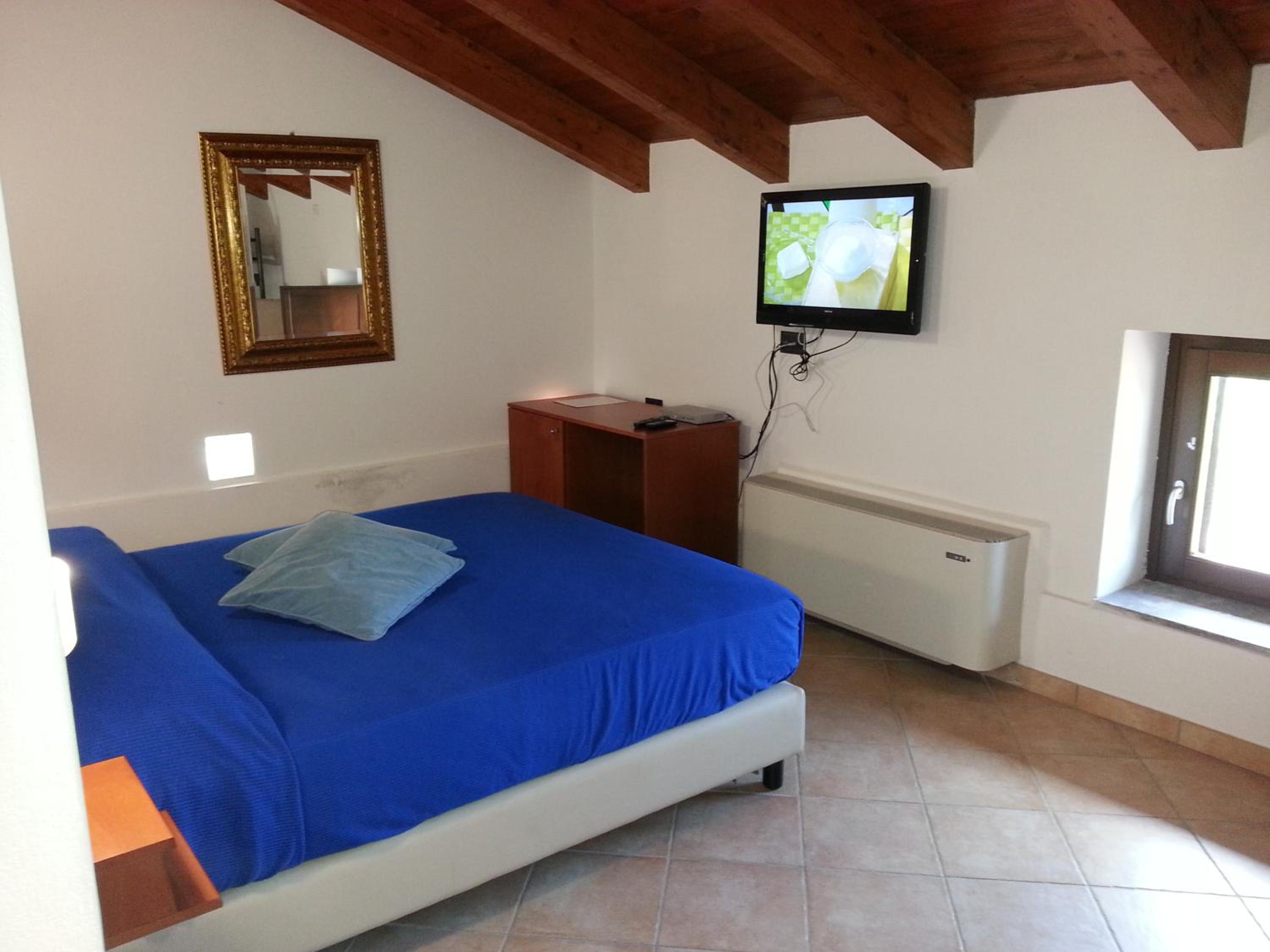 Quadruple Room with Private Bathroom