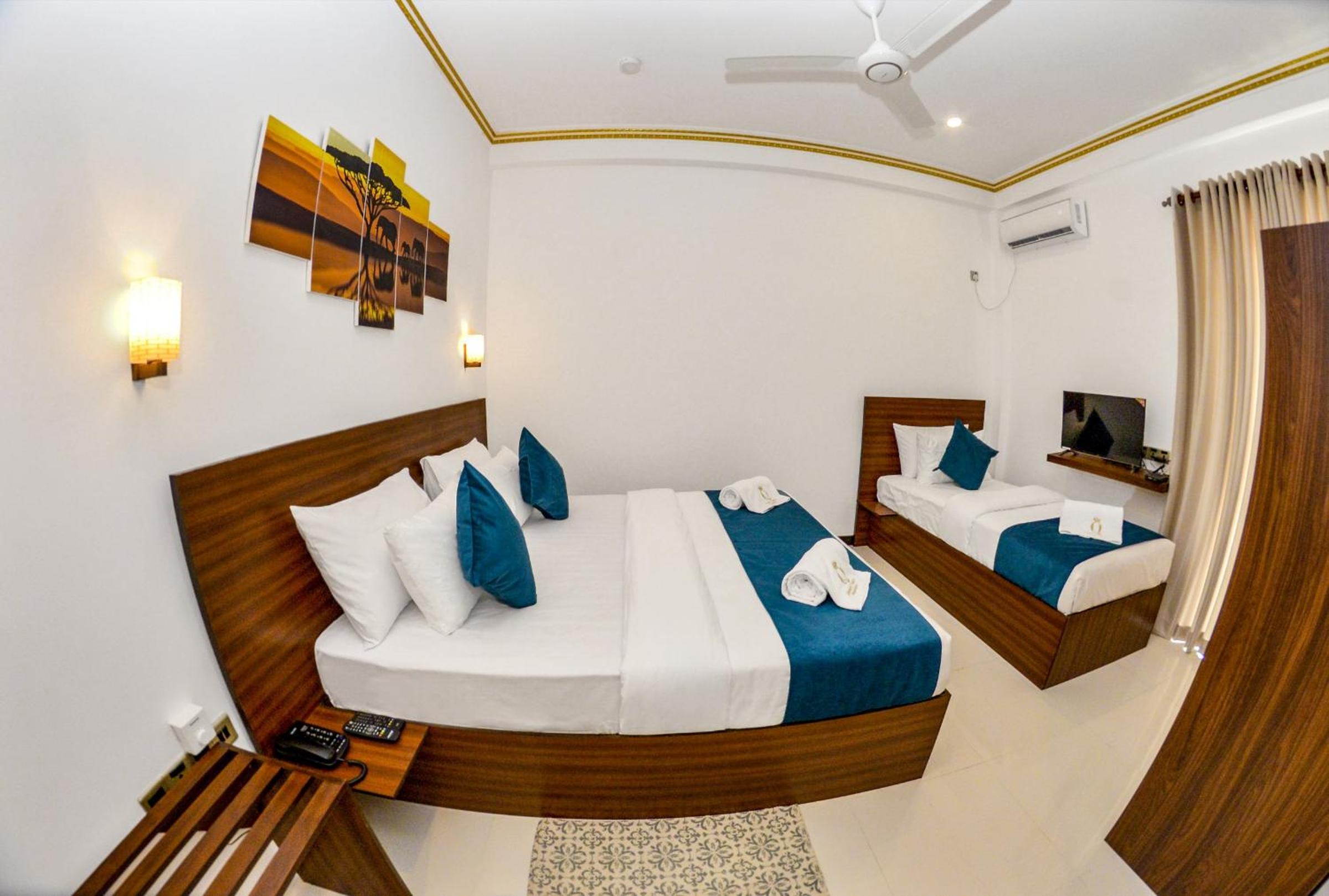 Deluxe Triple Room with Balcony
