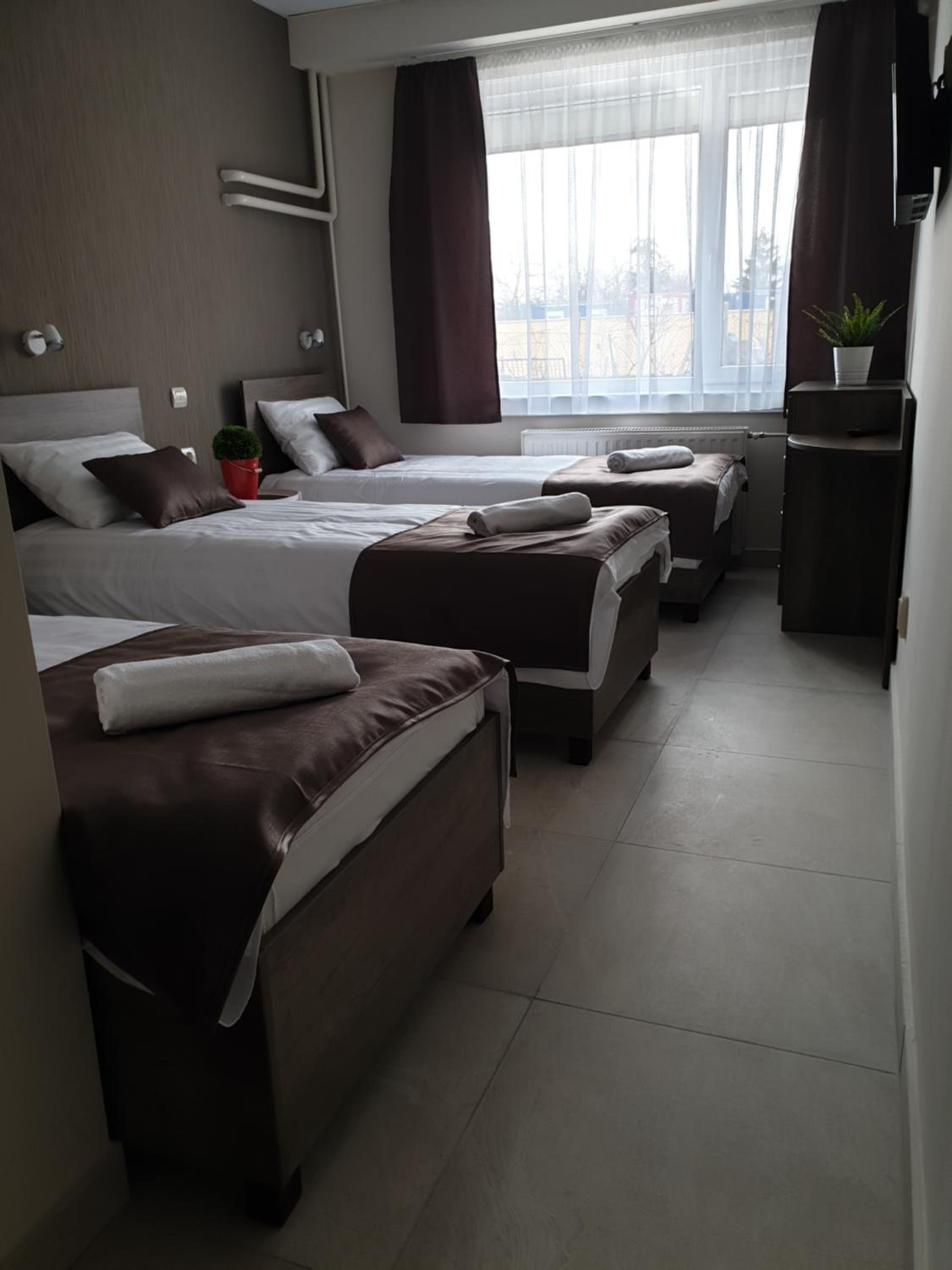 Standard Triple Room with Air-Conditioning - Photo 1