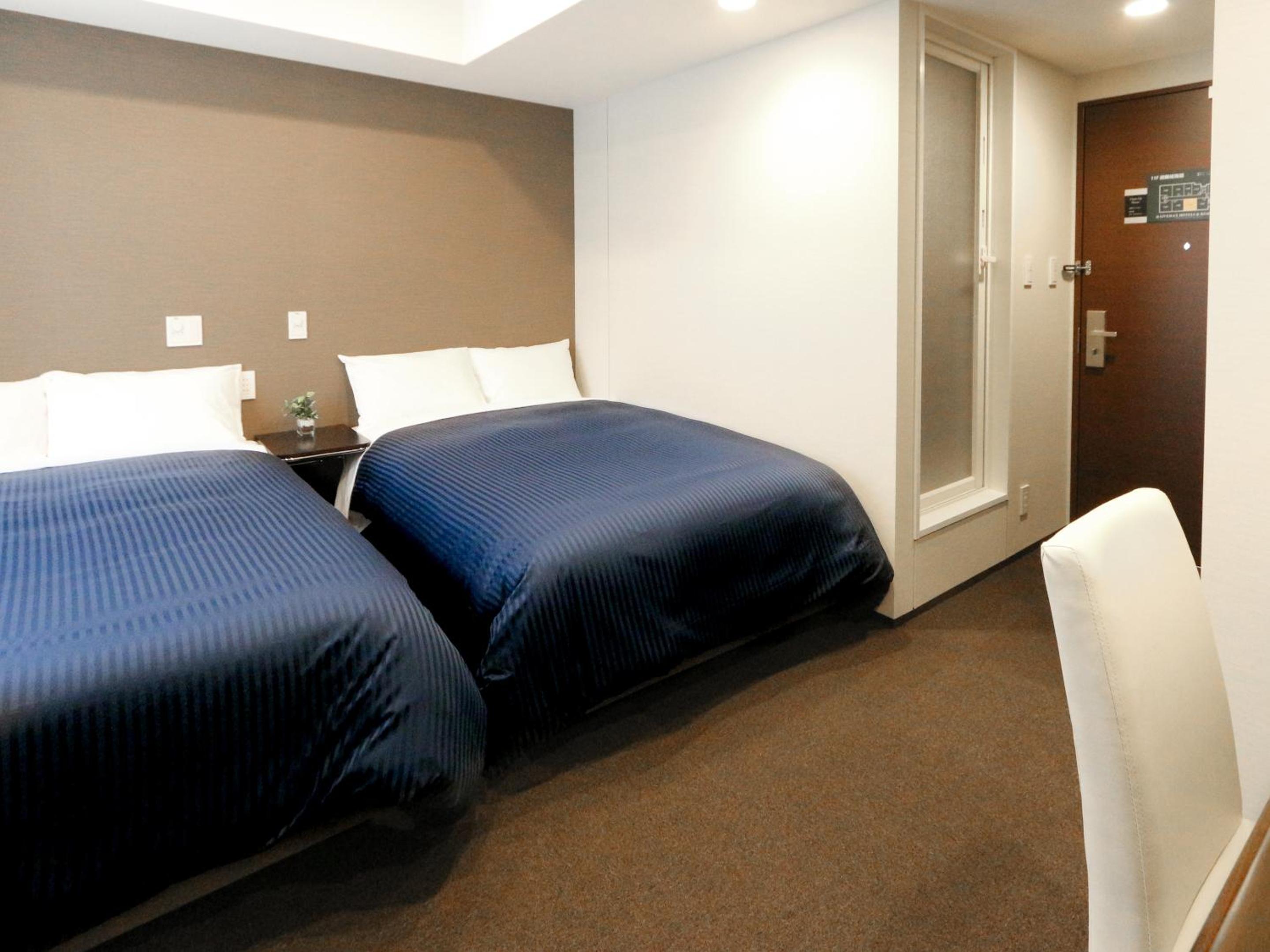 Twin Room - Non-Smoking photo 2