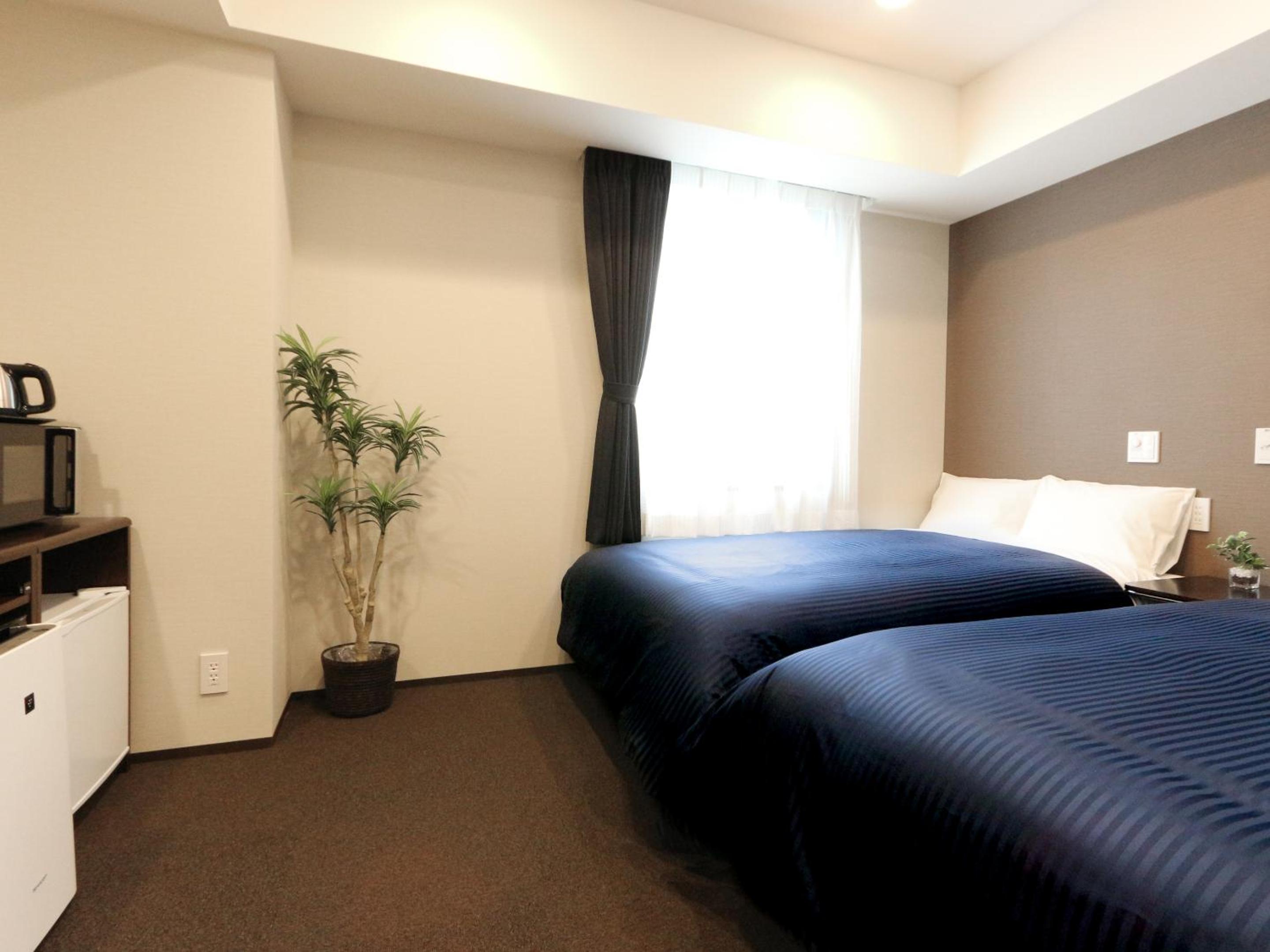 Twin Room - Non-Smoking photo 3