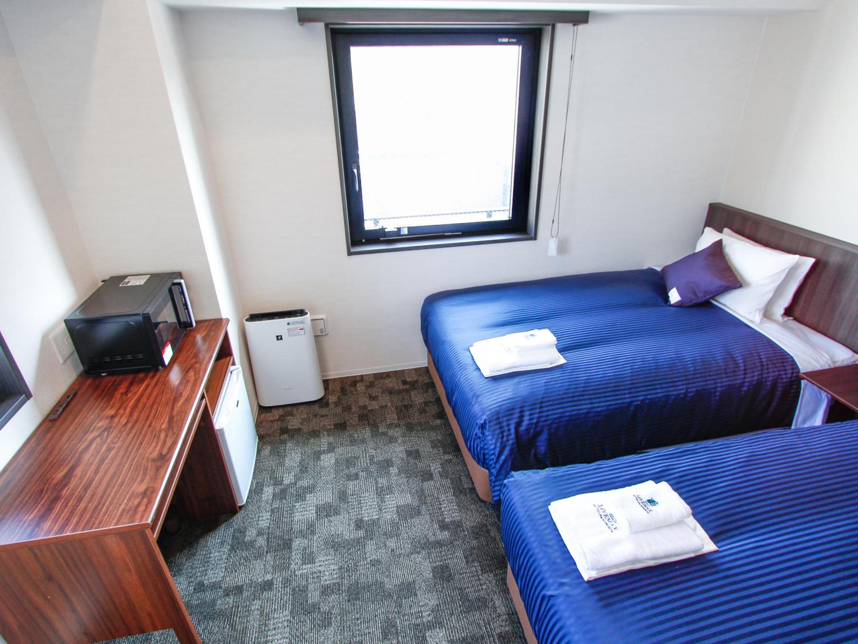 Twin Room - Non-Smoking photo 2