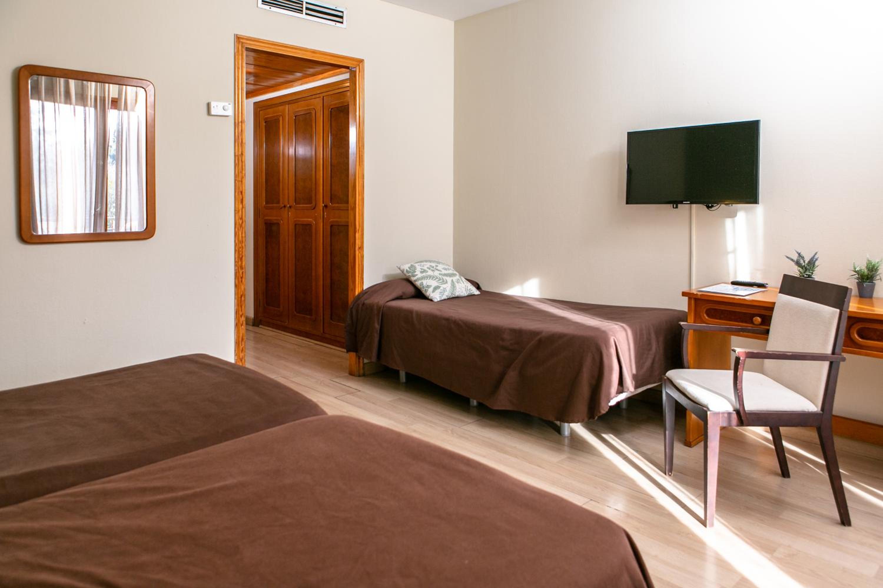 Habitación Superior Triple con Balcón