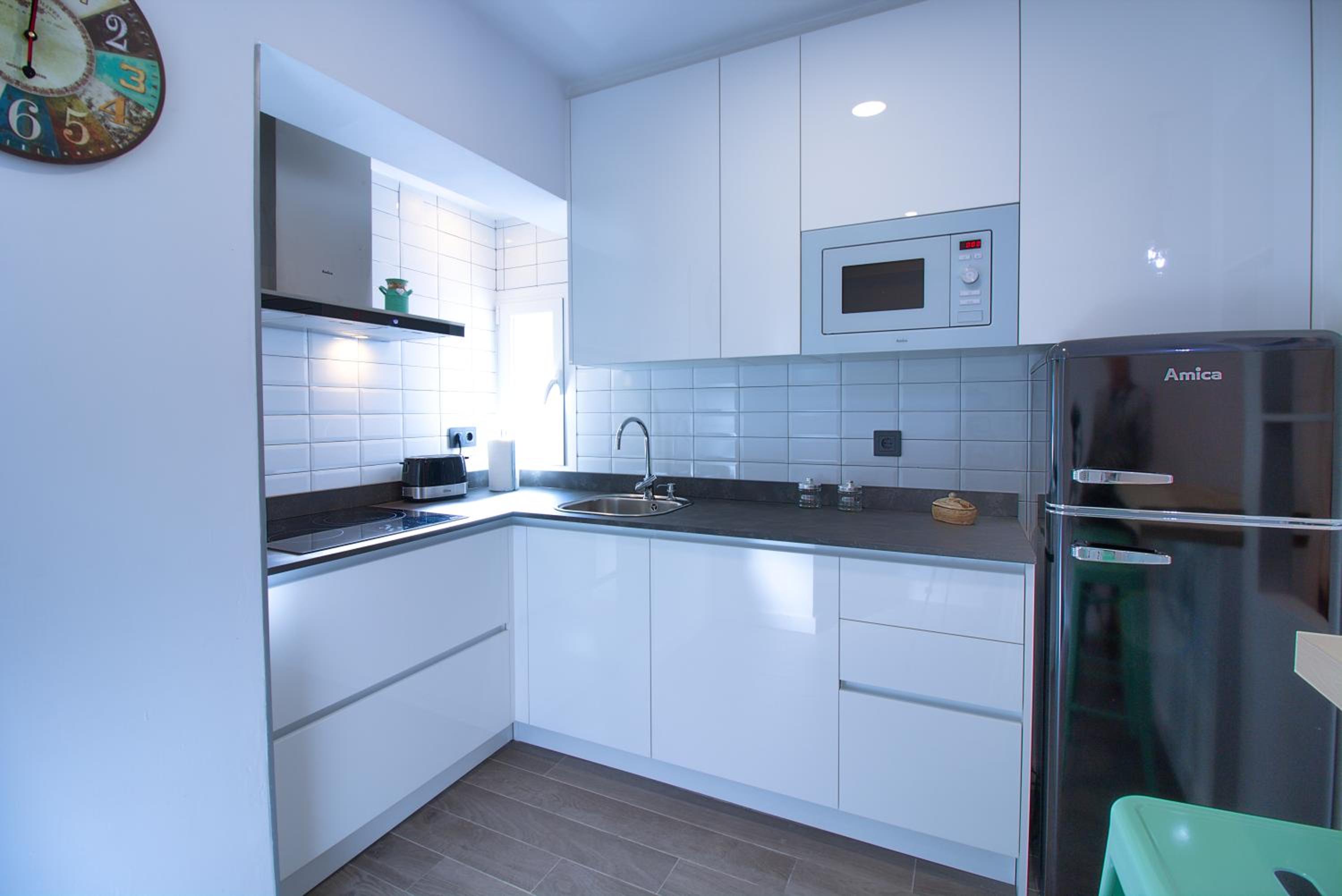 Three-Bedroom Apartment - Photo 32
