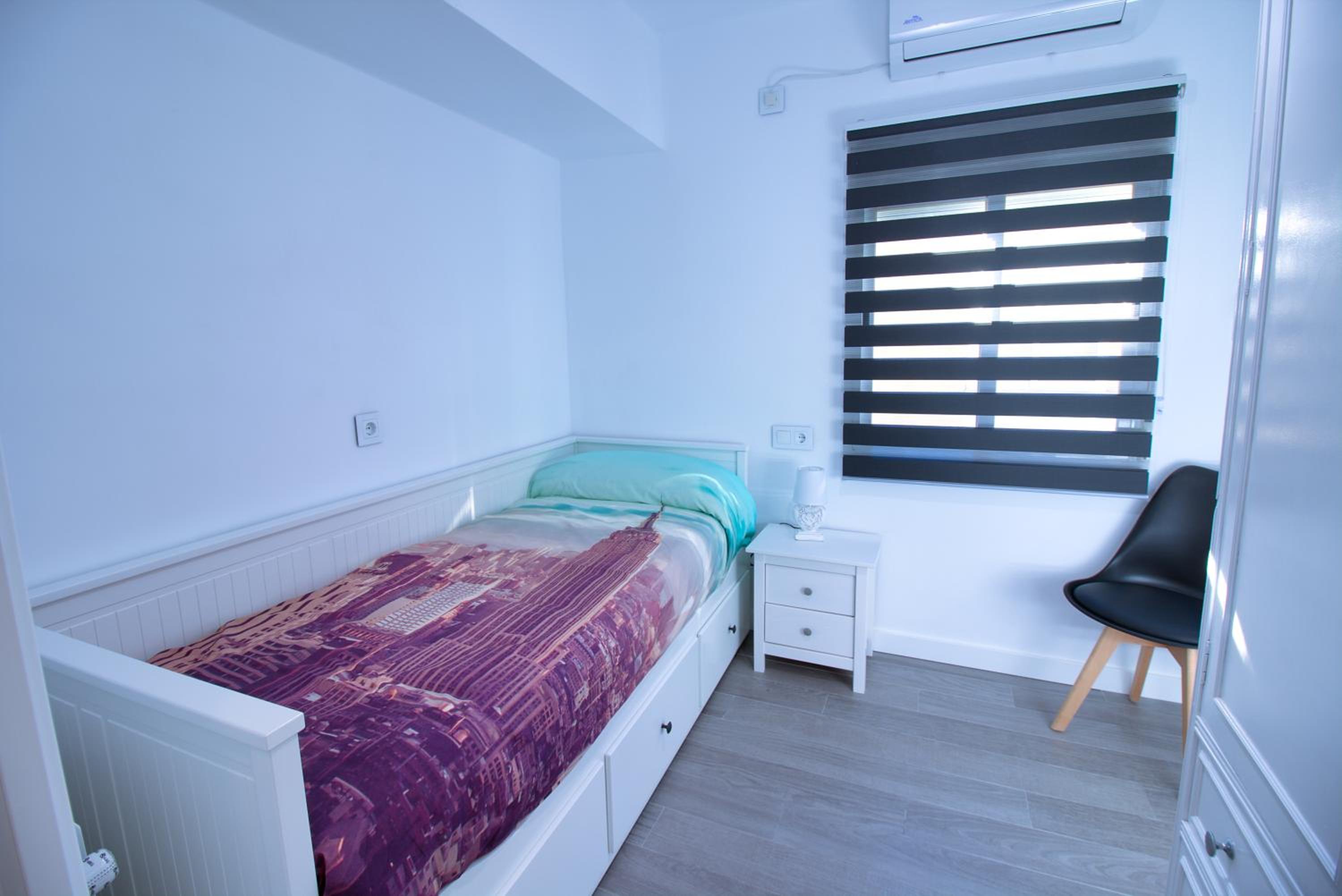 Three-Bedroom Apartment - Photo 33
