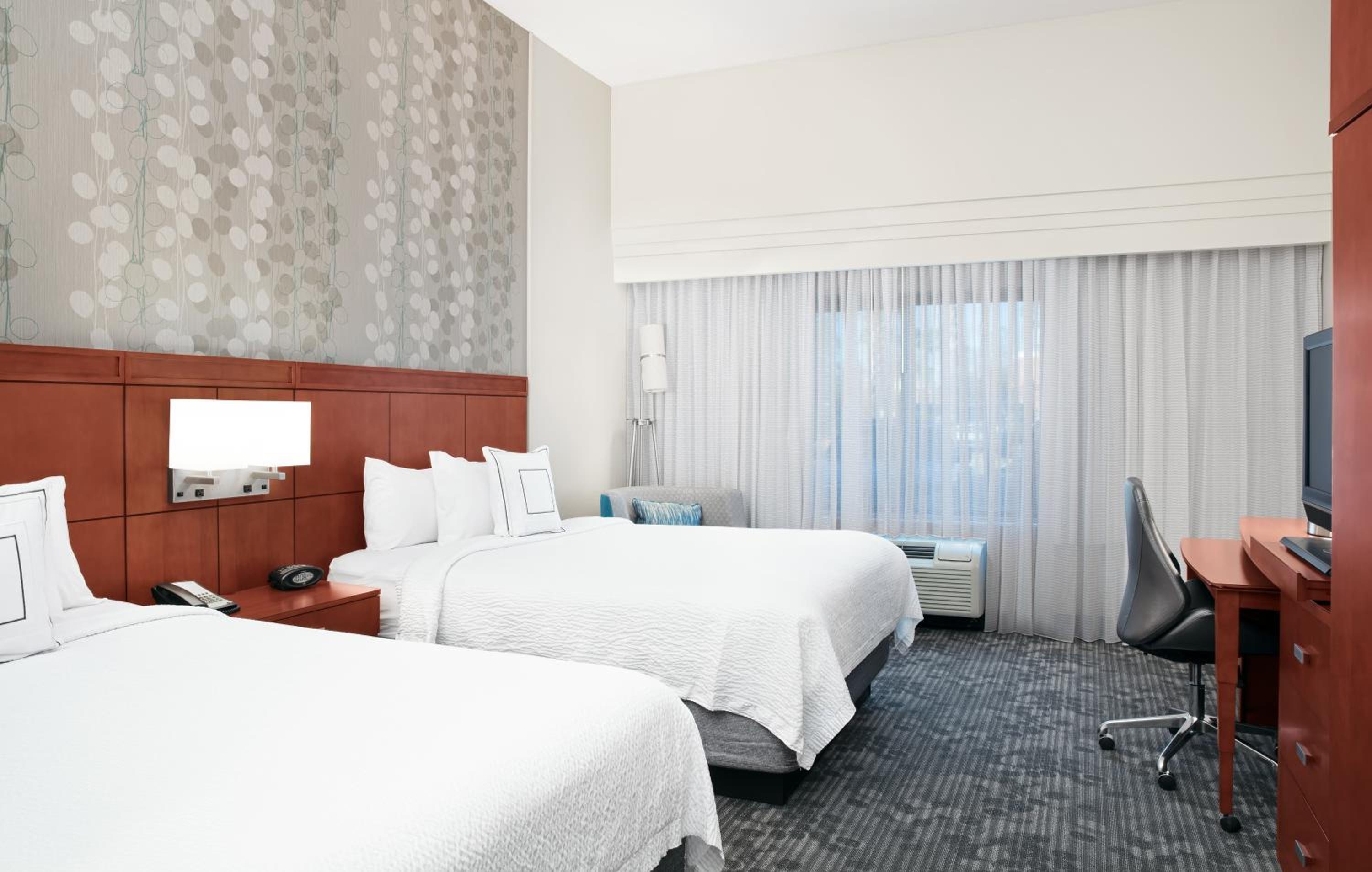 Queen Room with Two Queen Beds - Photo 1
