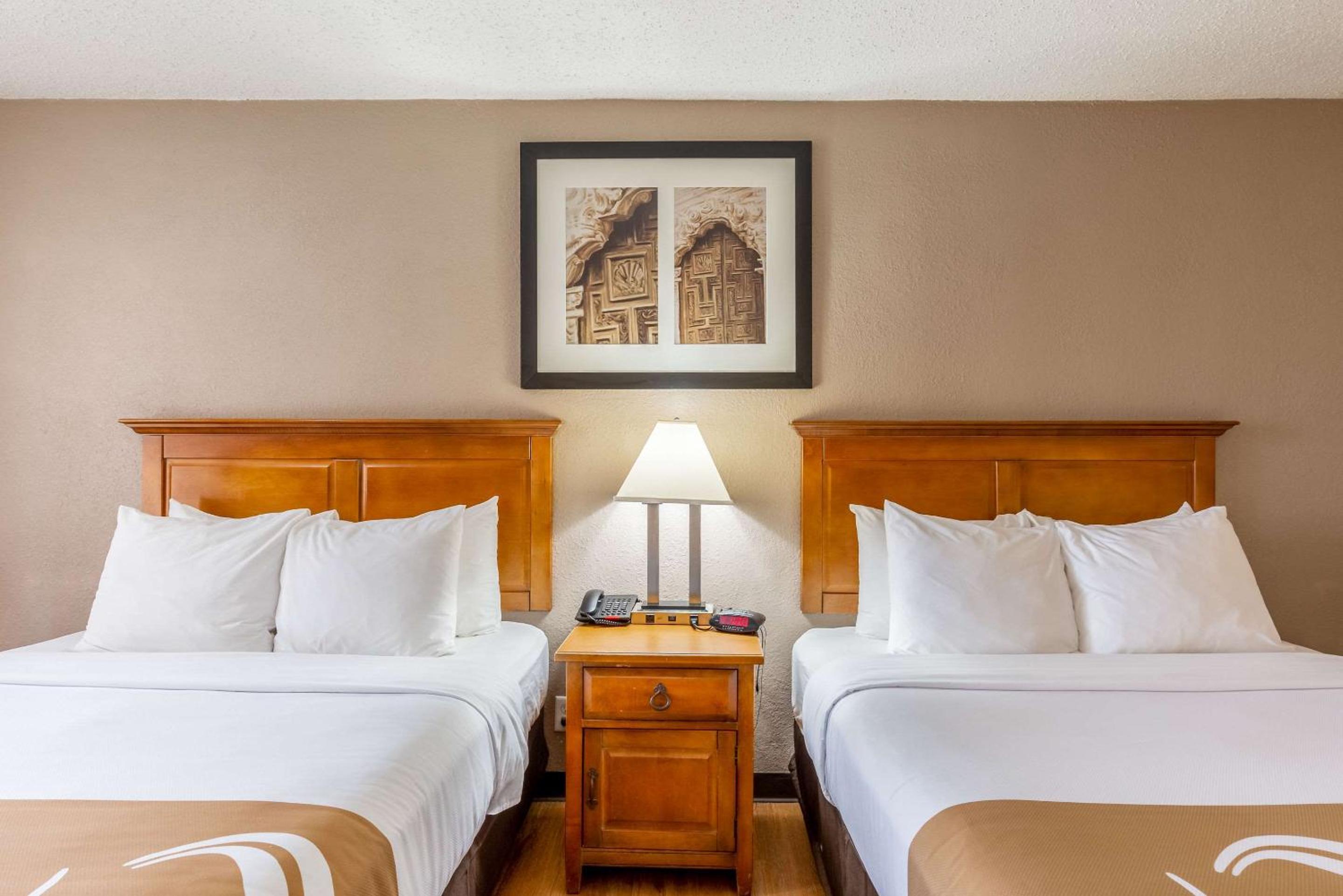 Premium Queen Room with Two Queen Beds - Photo 1