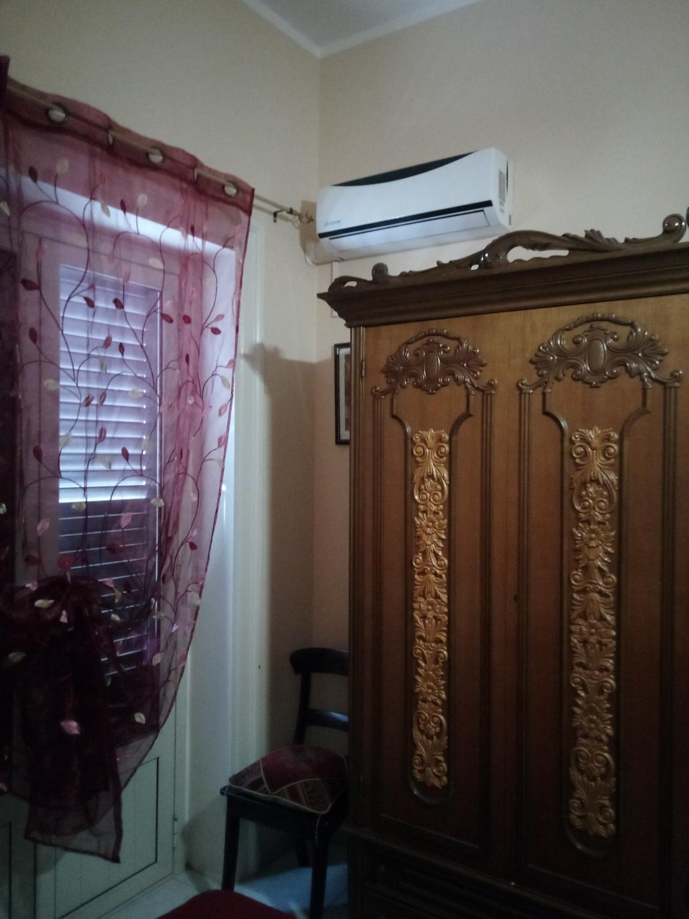 Economy Triple Room With Shared Bathroom