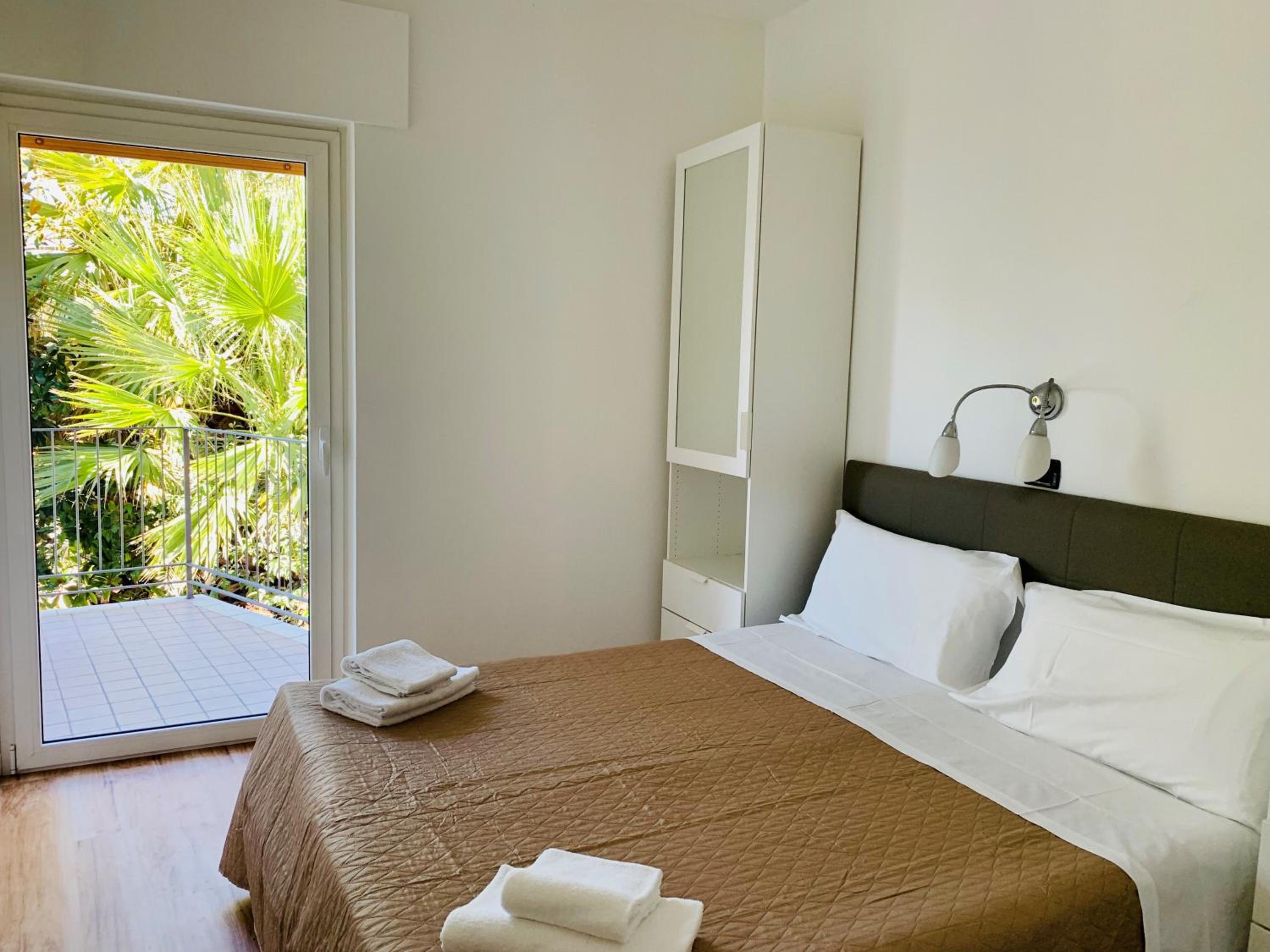 Three-Bedroom Apartment with Balcony photo 1