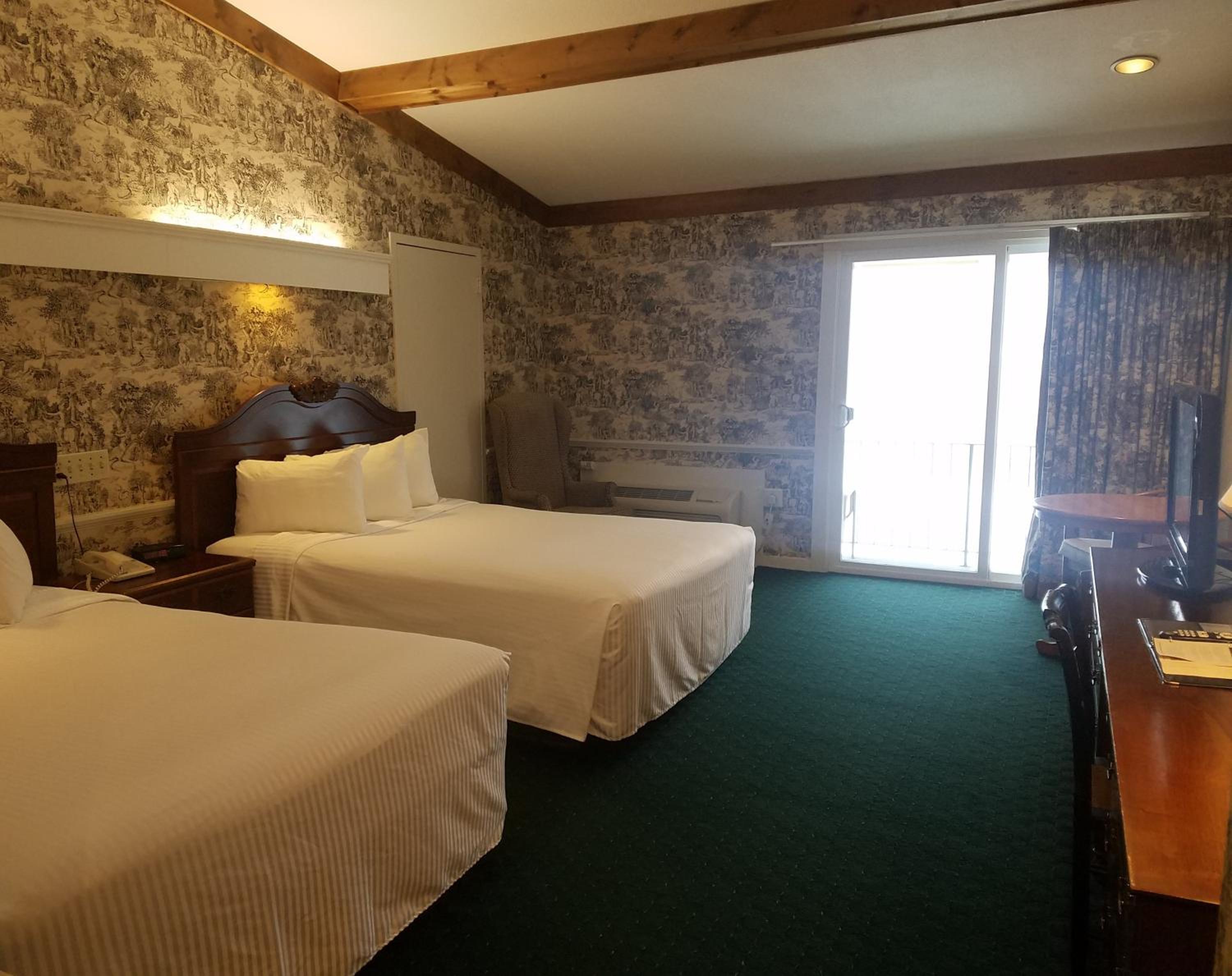 Queen Room with Two Queen Beds - Photo 1