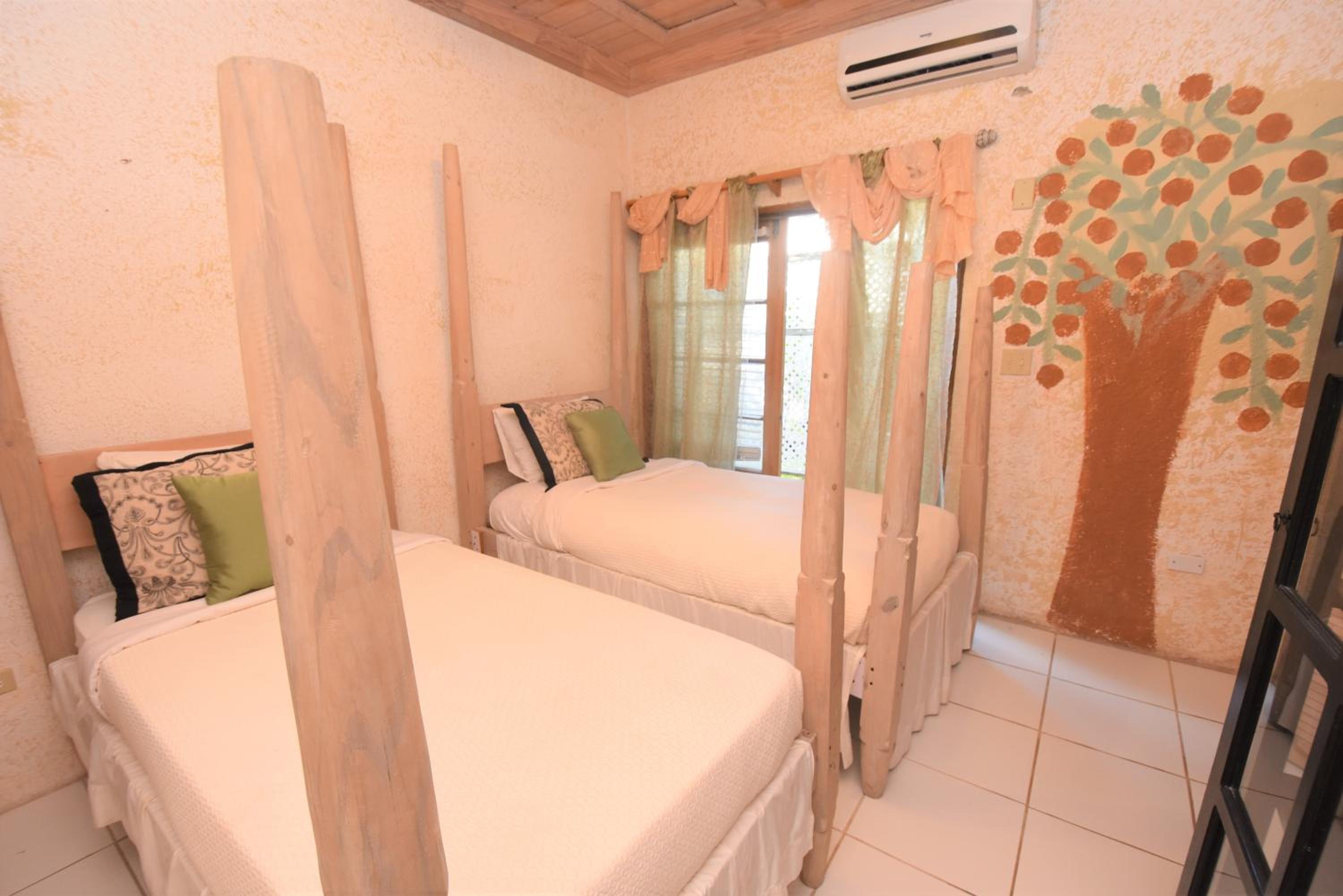 Two-Bedroom Suite with Garden View with One Queen and Two Singles photo 3