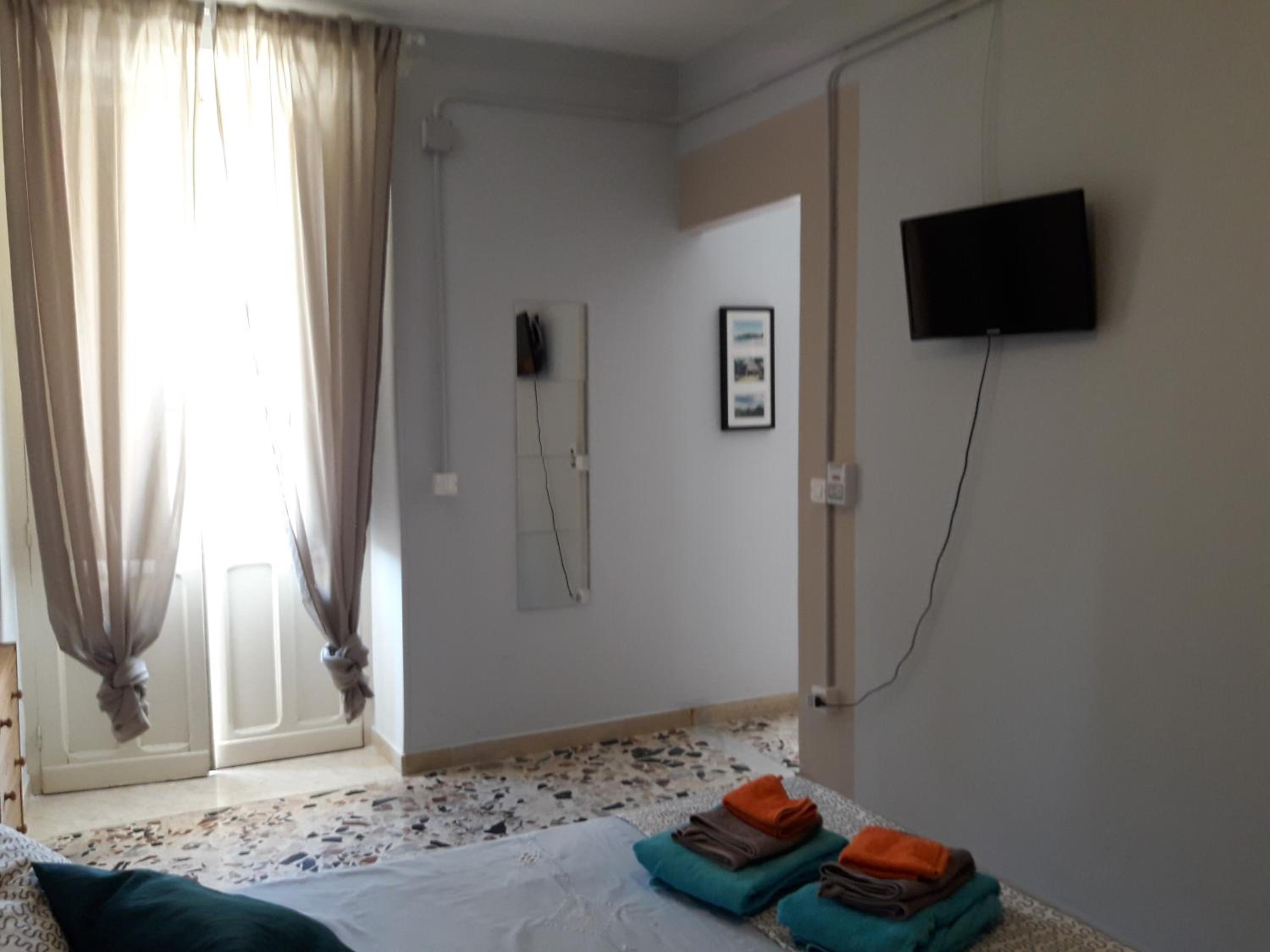 Quadruple Room with Private Bathroom