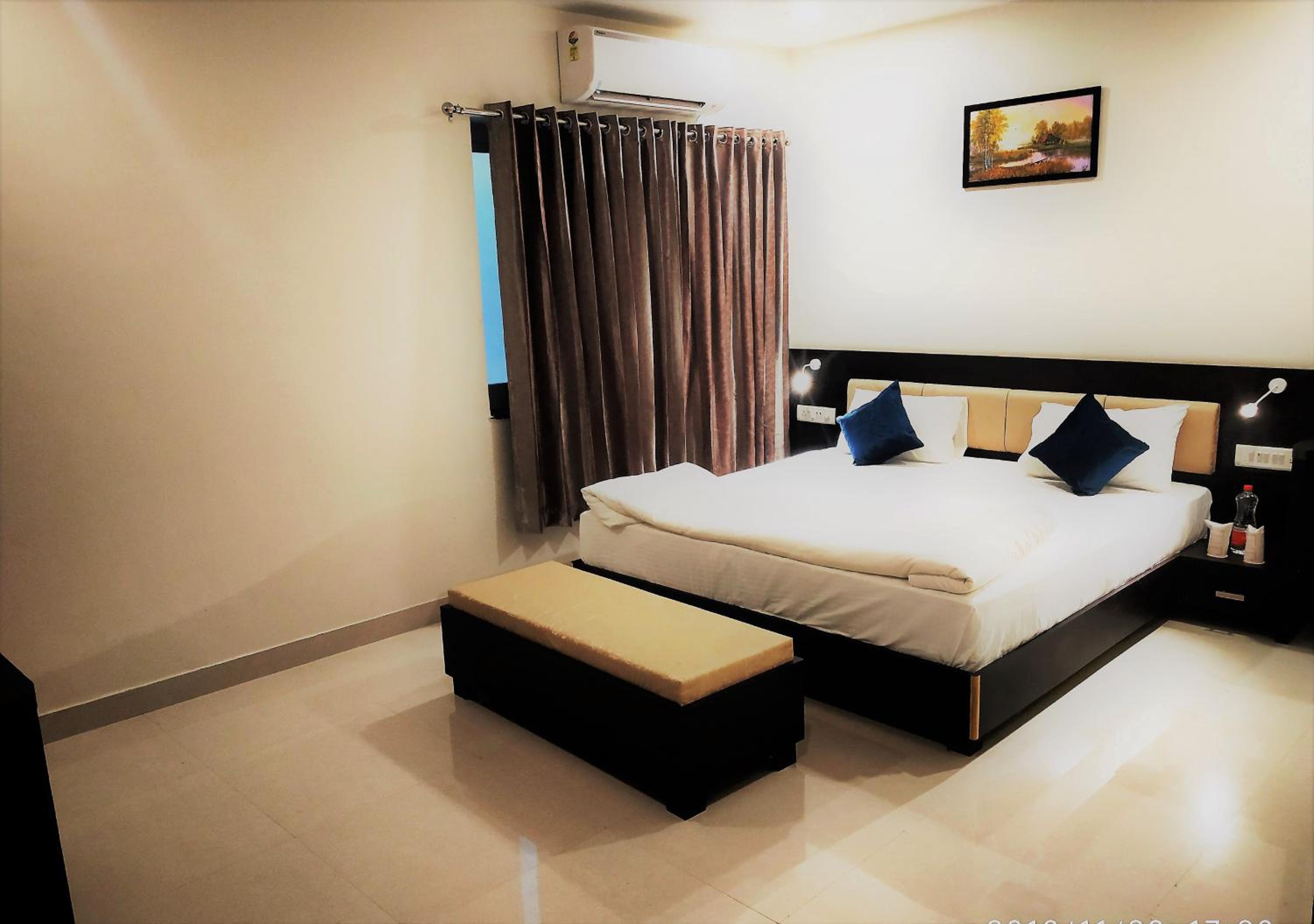 Deluxe Room - Photo 1