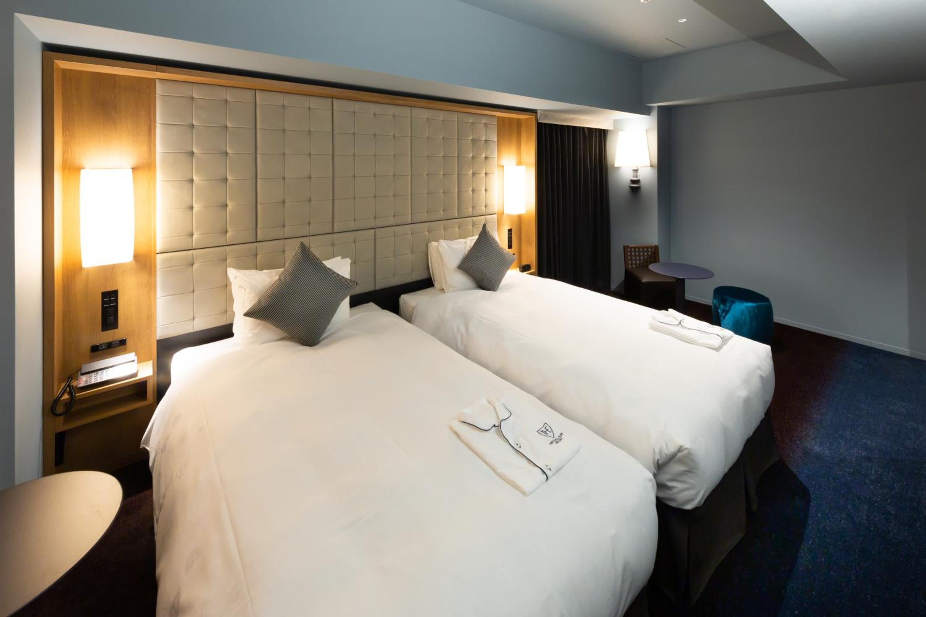 Deluxe Triple Room - Photo 8