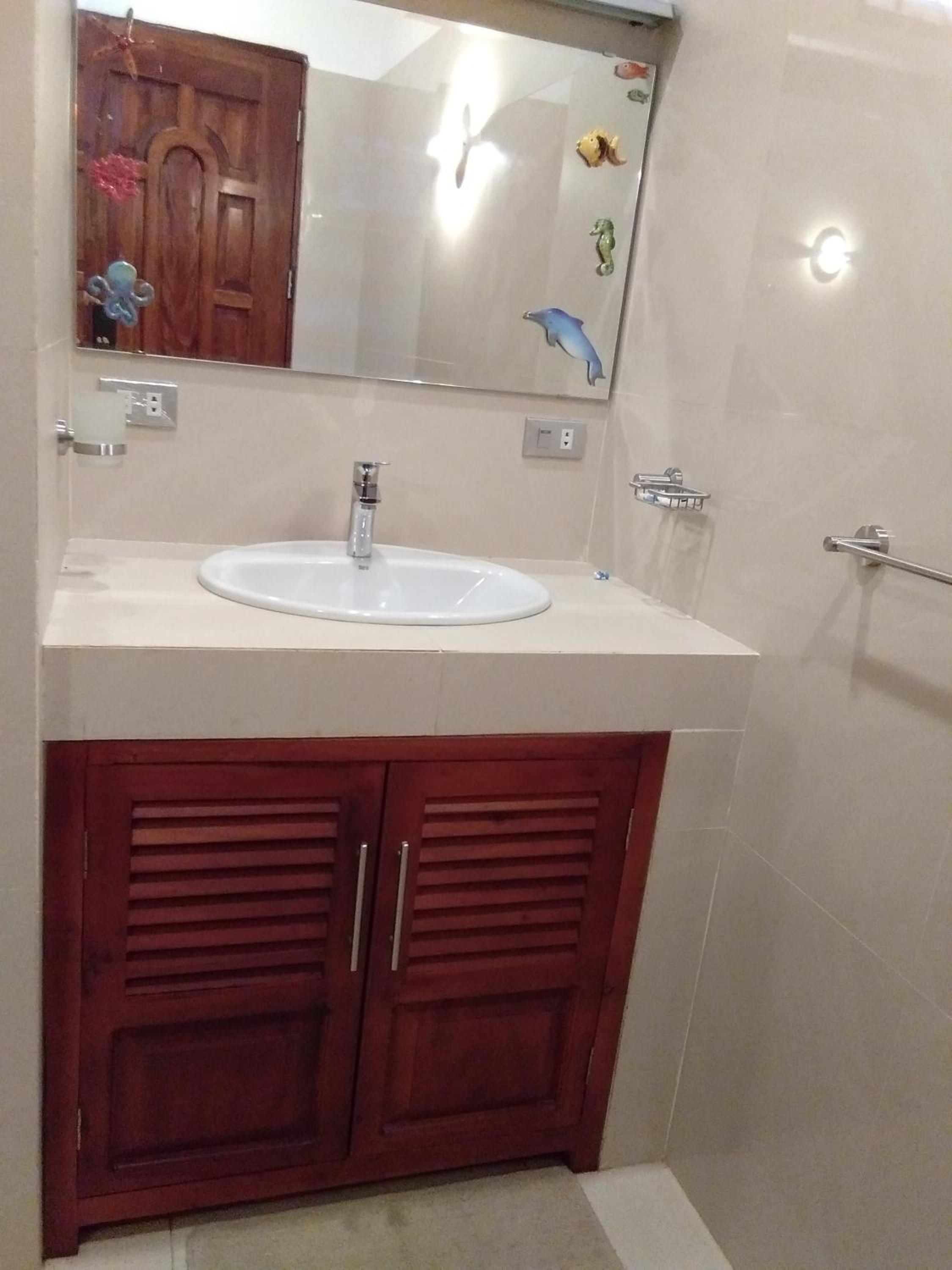 Three-Bedroom House - Photo 34