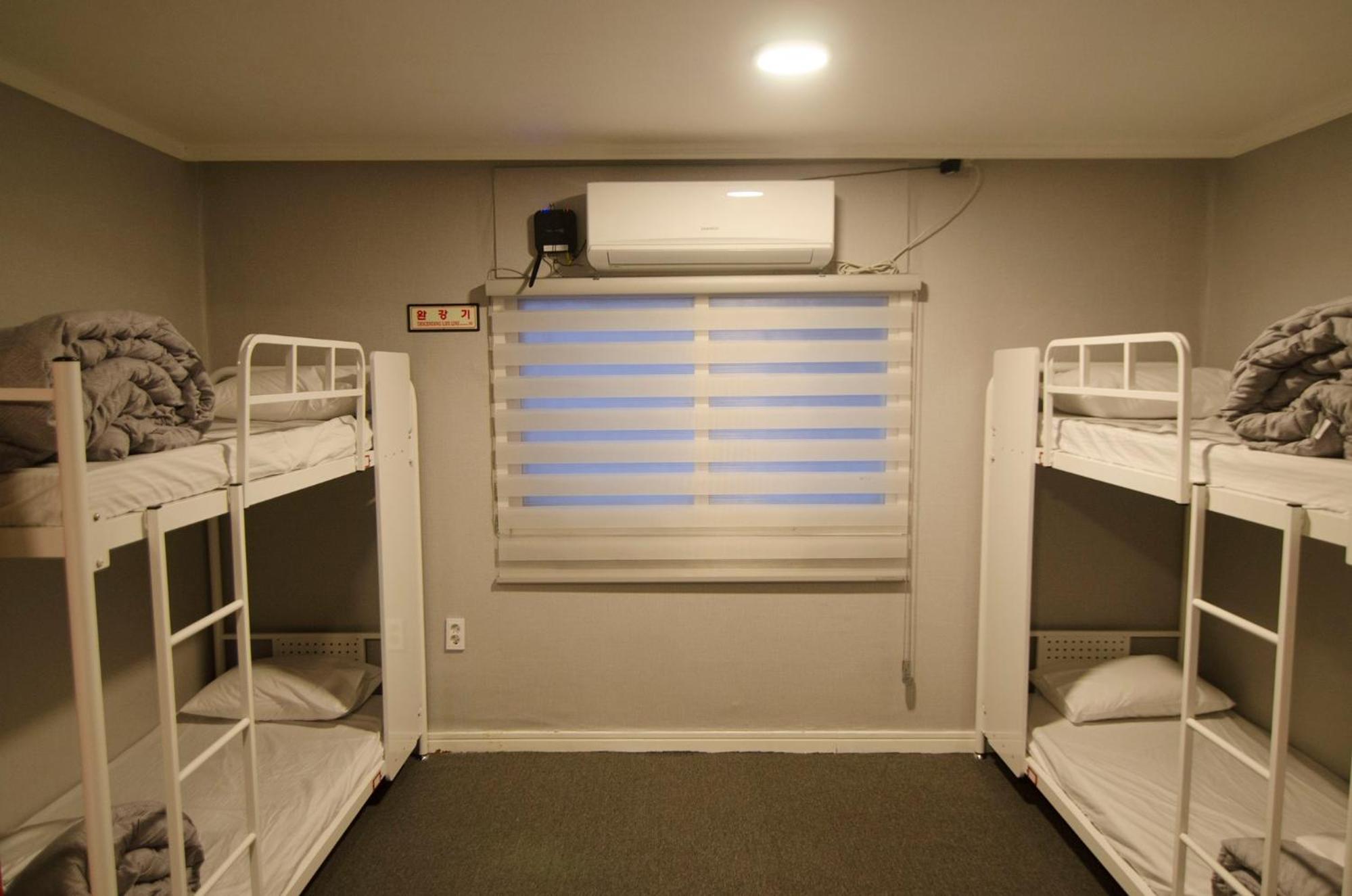 Quadruple Room with Private Bathroom - Photo 1