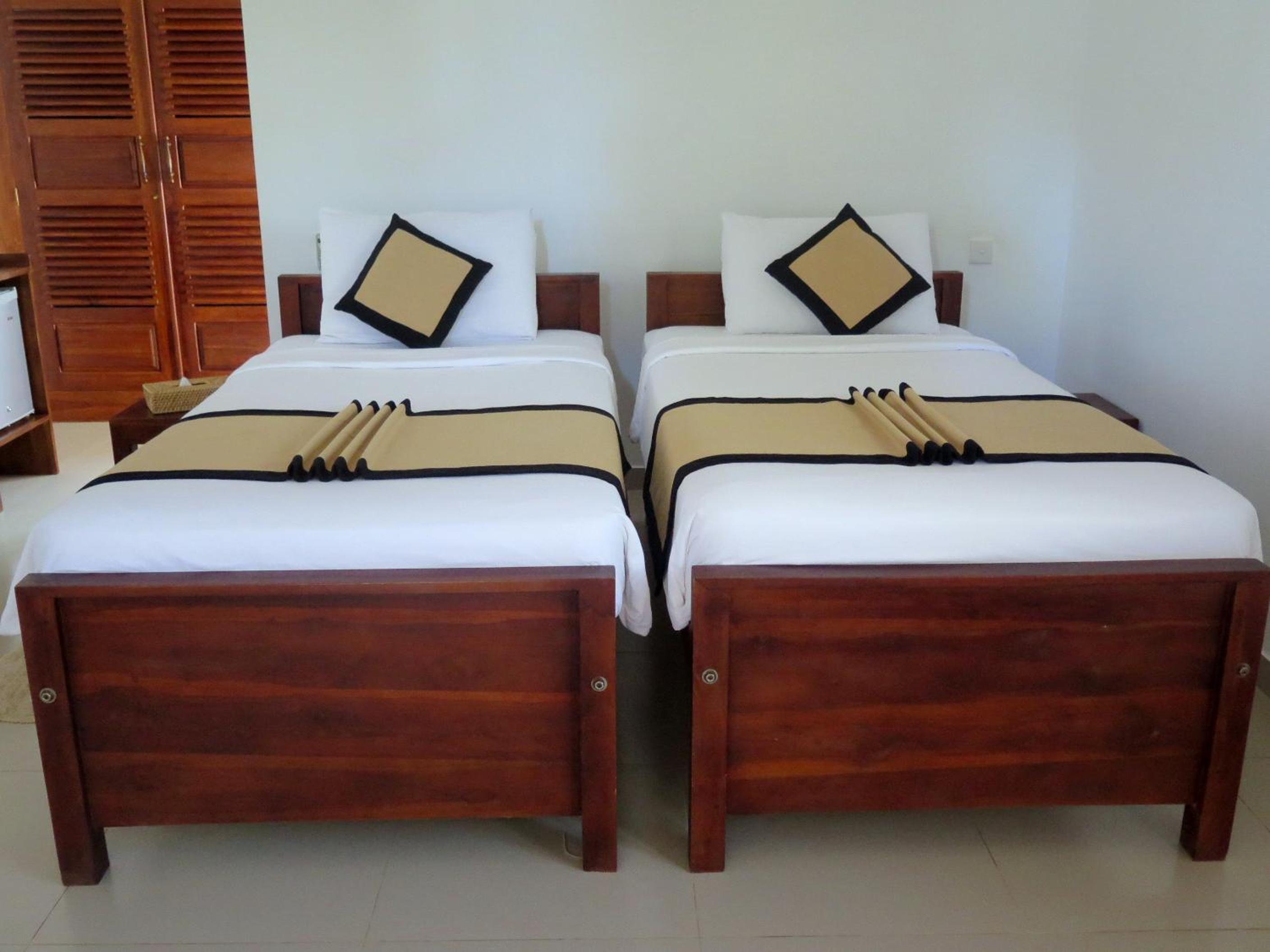 Deluxe Zweibettzimmer mit Balkon und Meerblick