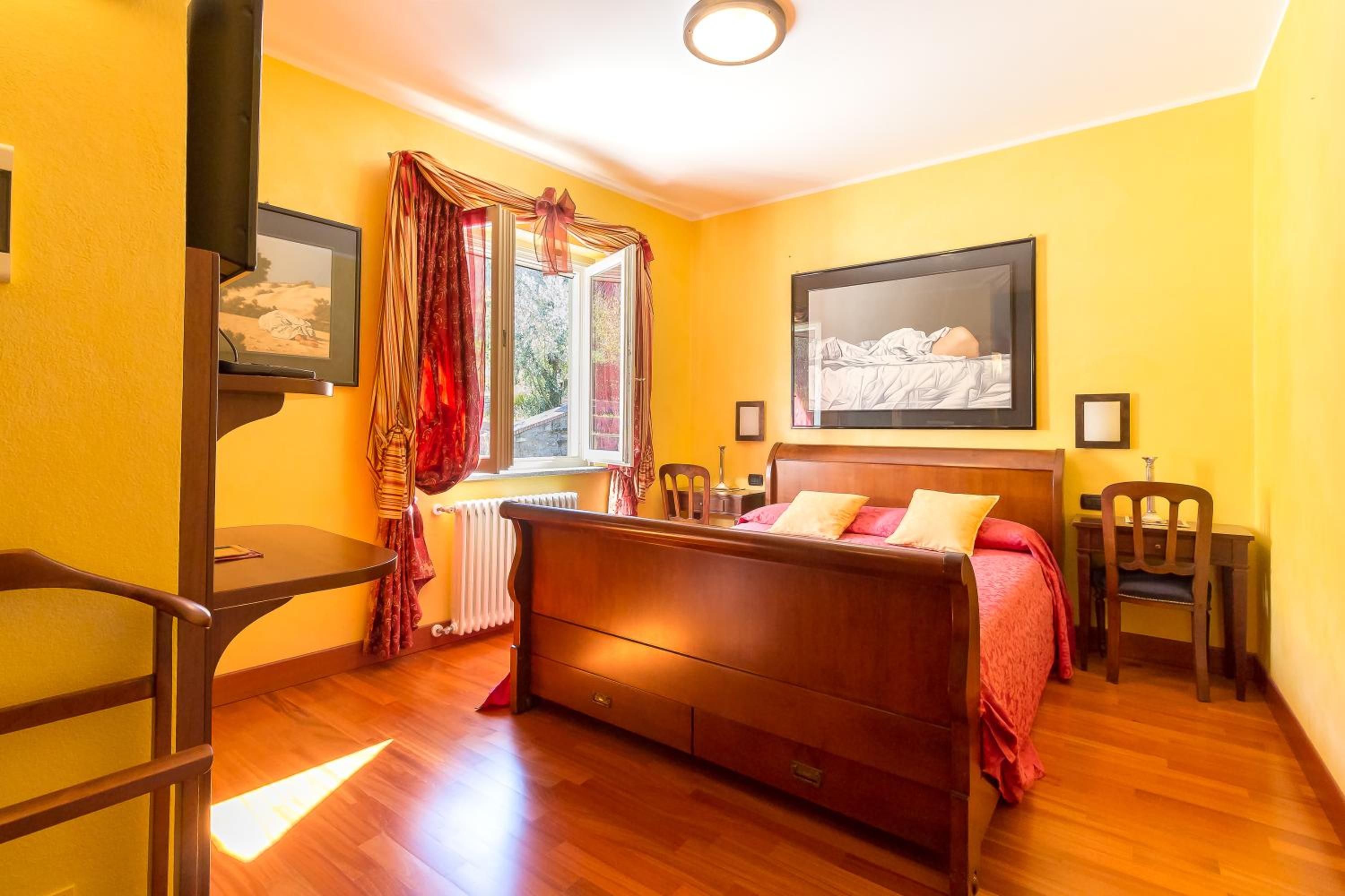 Deluxe Room - Photo 1