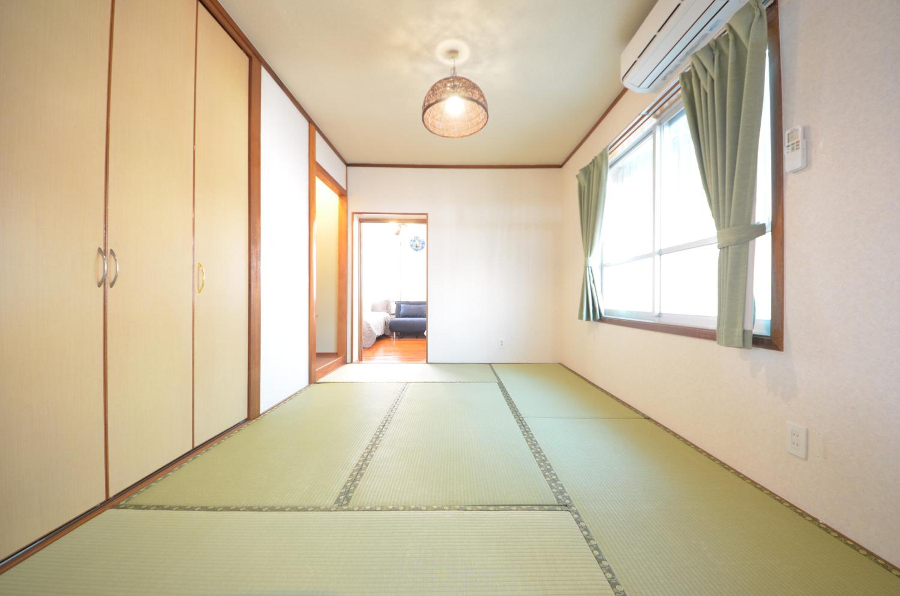 Three-Bedroom Apartment - Photo 12