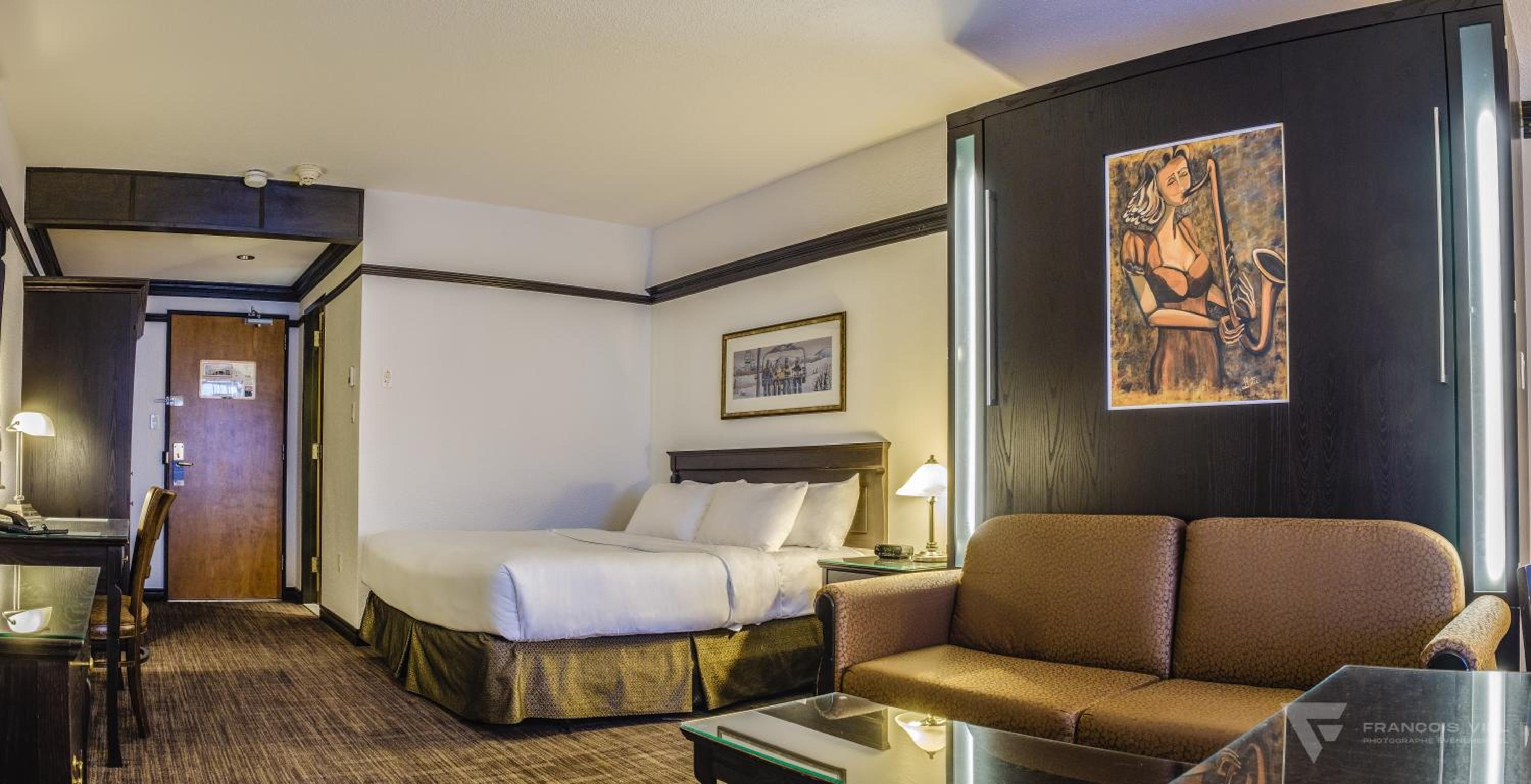 Spacious Queen Room with Two Queen Beds - Photo 1