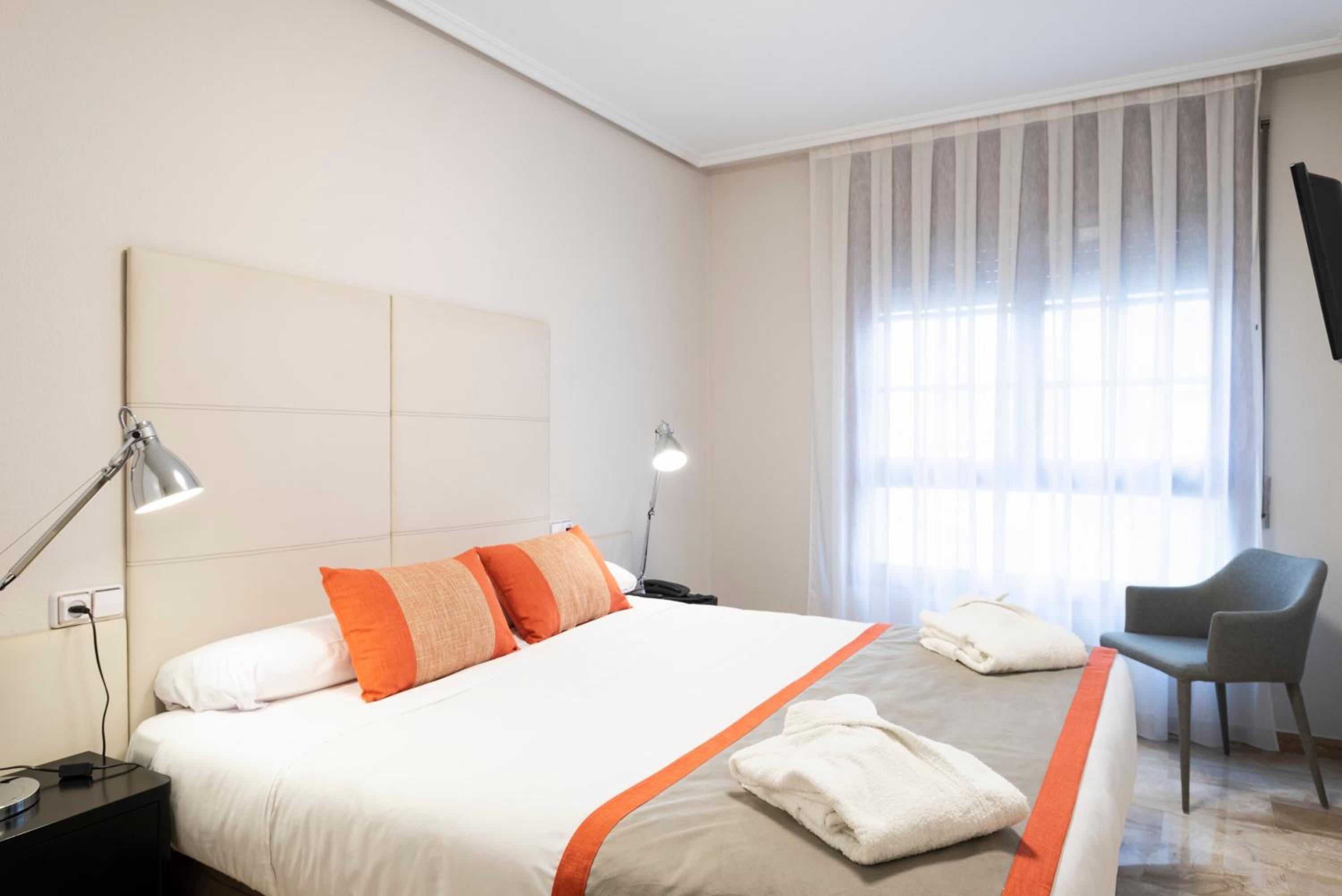 1 Bedroom Apartment (2 Adults) - Photo 1